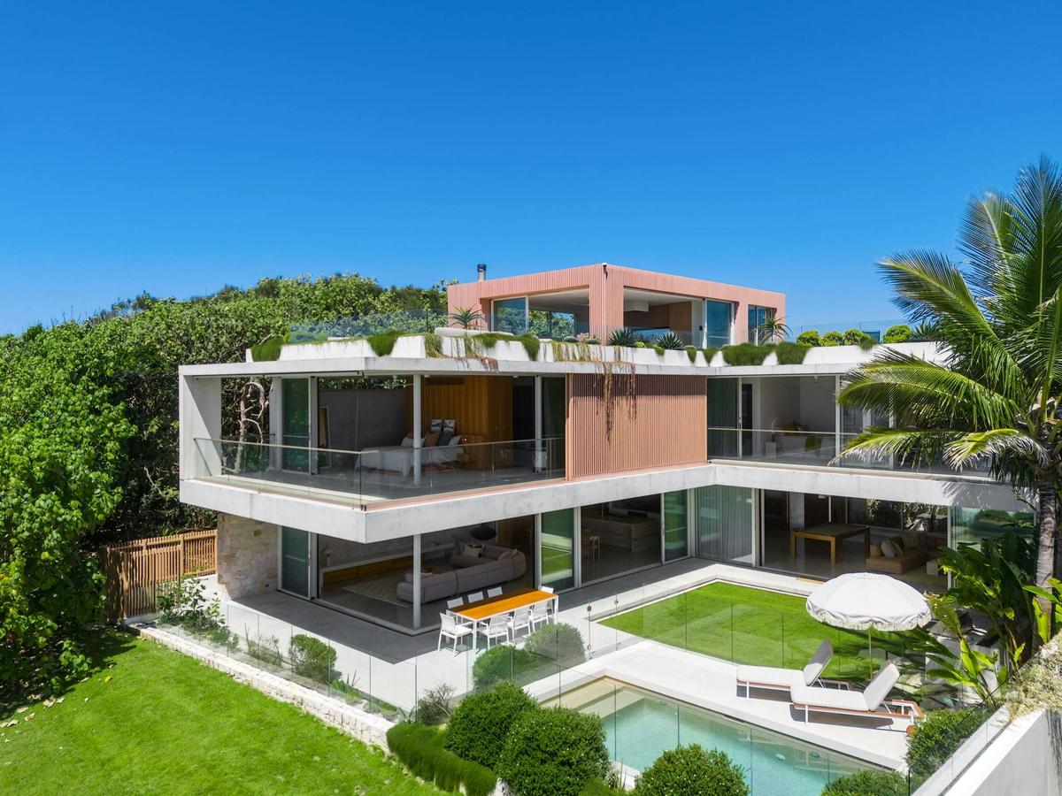 Luxurious three-storey beachfront escape offering 360-degree ocean and hinterland views