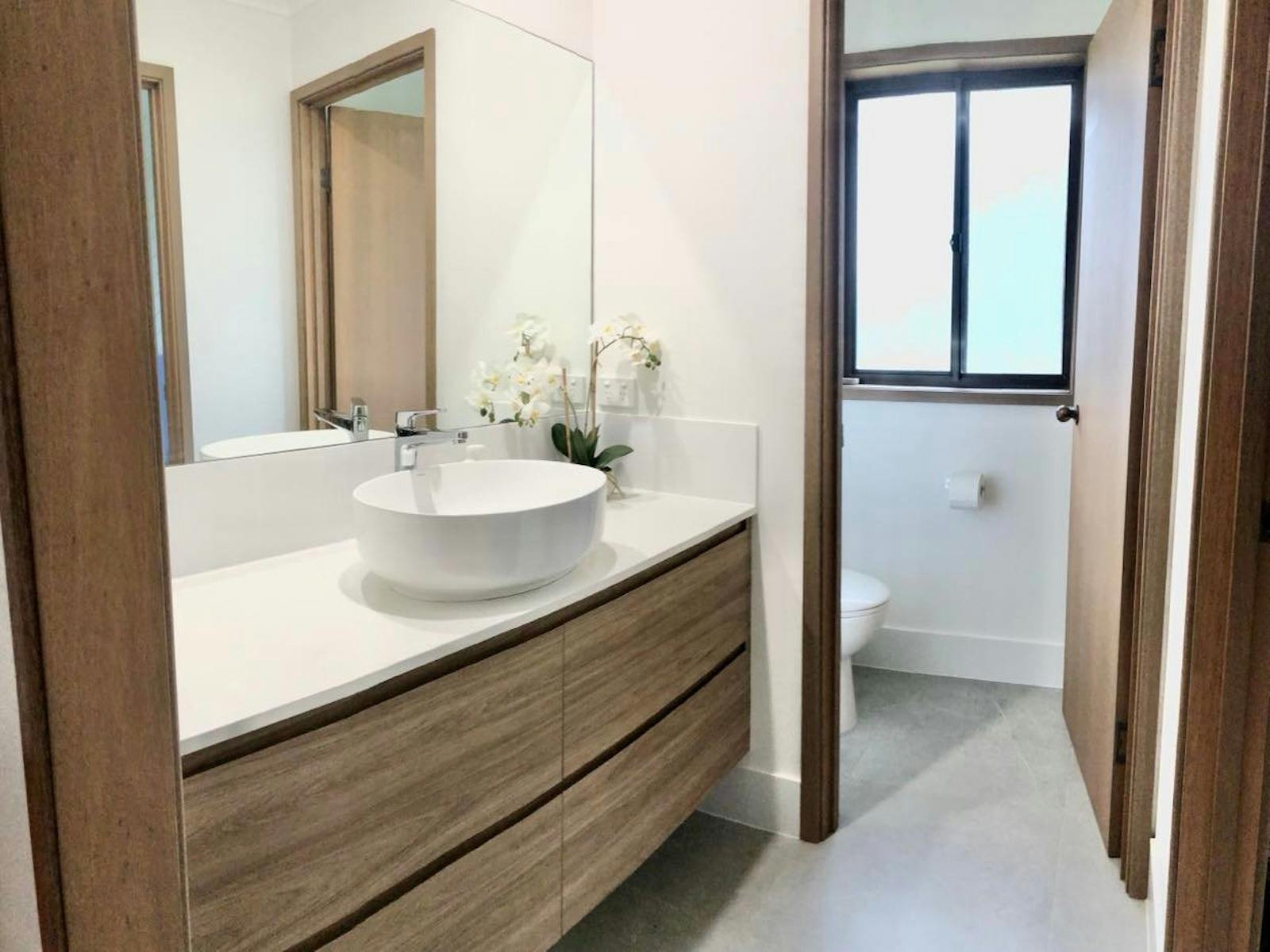 Main Modern Bathroom With Seperate Toilet, Basin and Bath/Shower Area