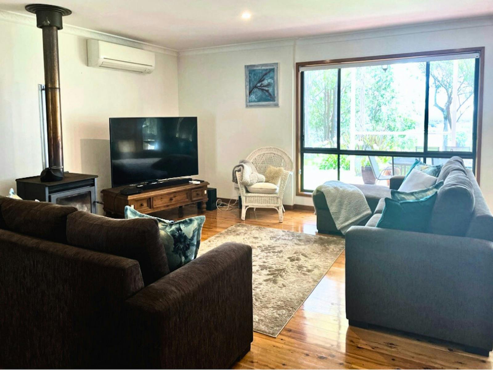 Lounge Area With Wood Fire Heater