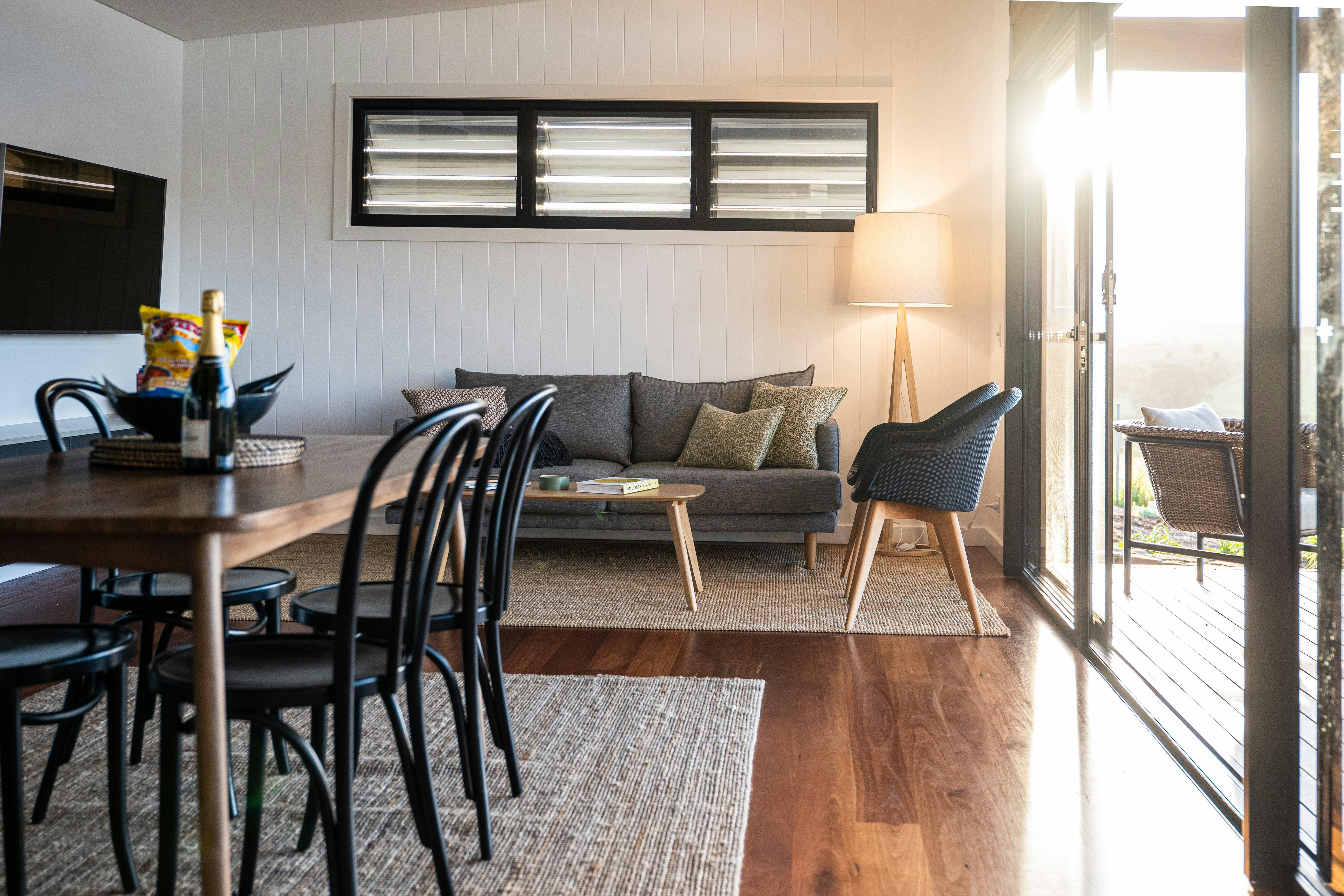 Open plan living, dining and a fully equipped kitchen with European appliances.