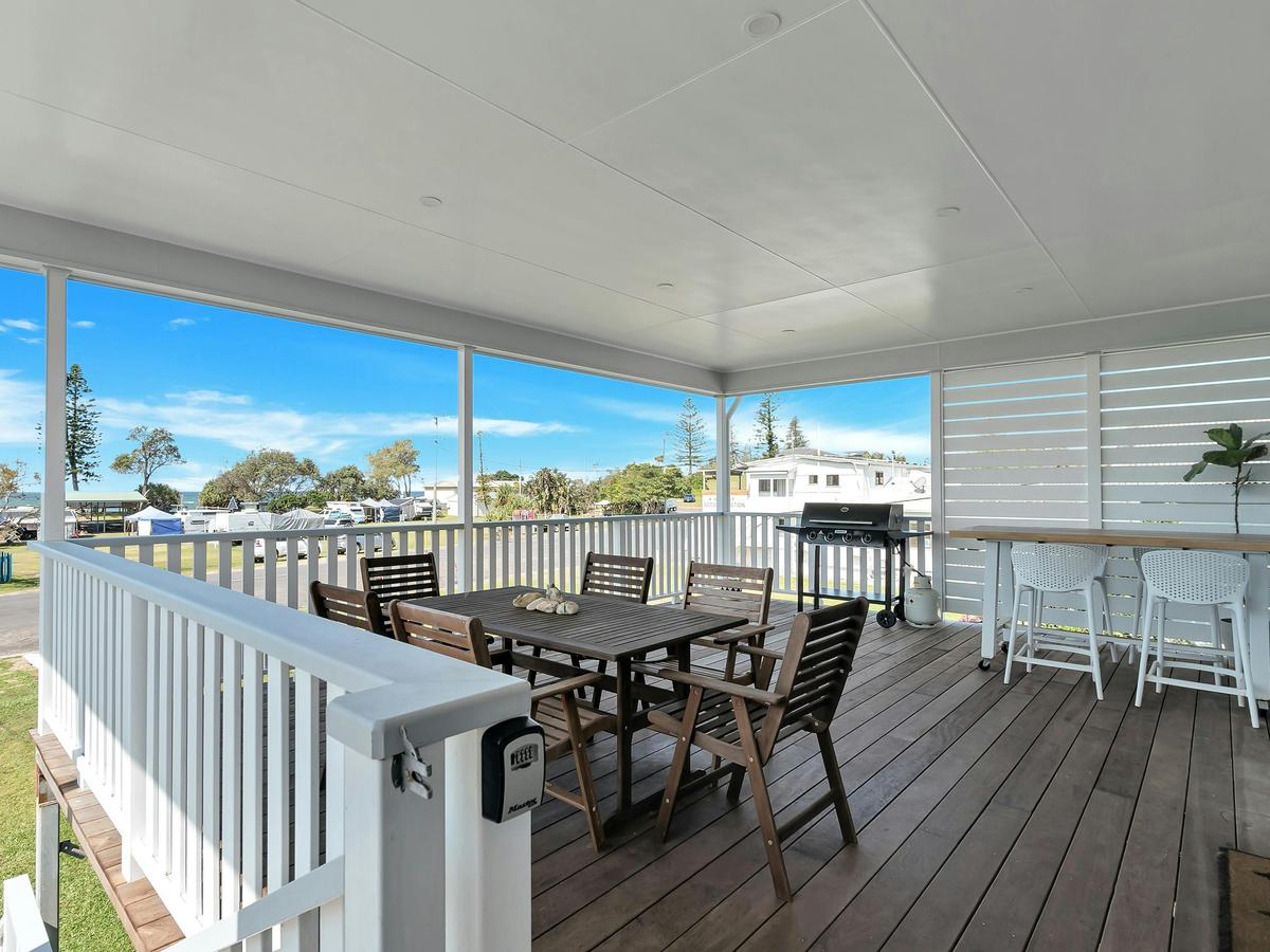 A large, inviting deck perfect for relaxing and taking in the ocean breeze.
