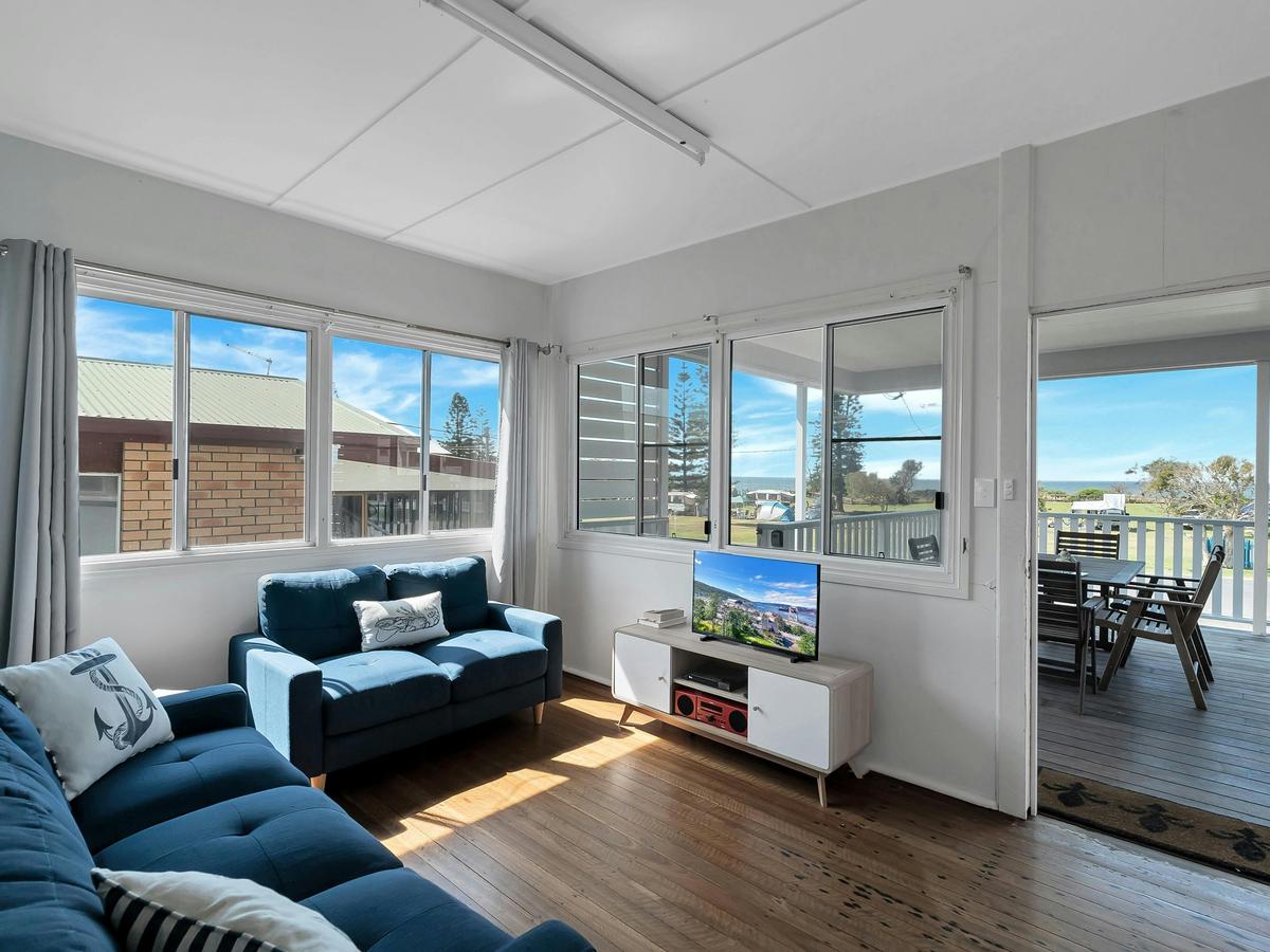 A welcoming, comfortable lounge area filled with natural light.
