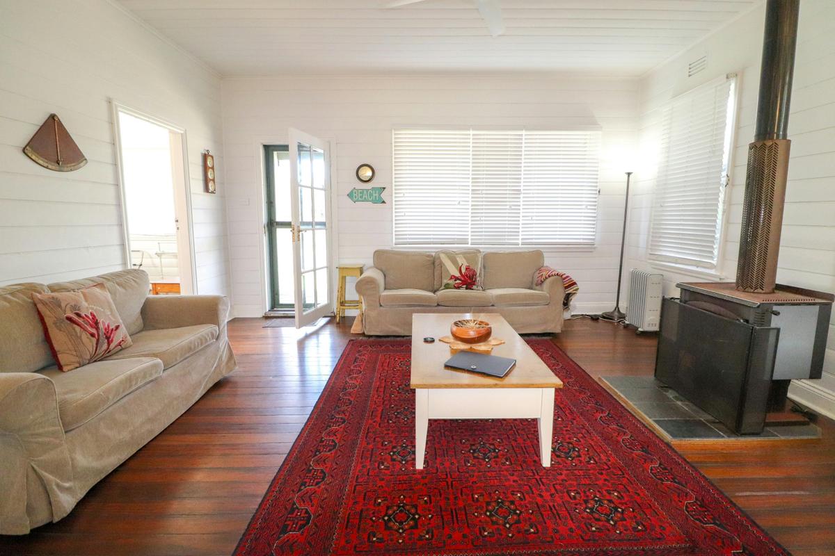 Living area with plenty of seating and fireplace
