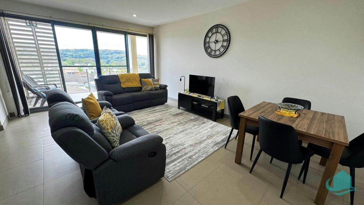 Lounge room with view over Caves Beach