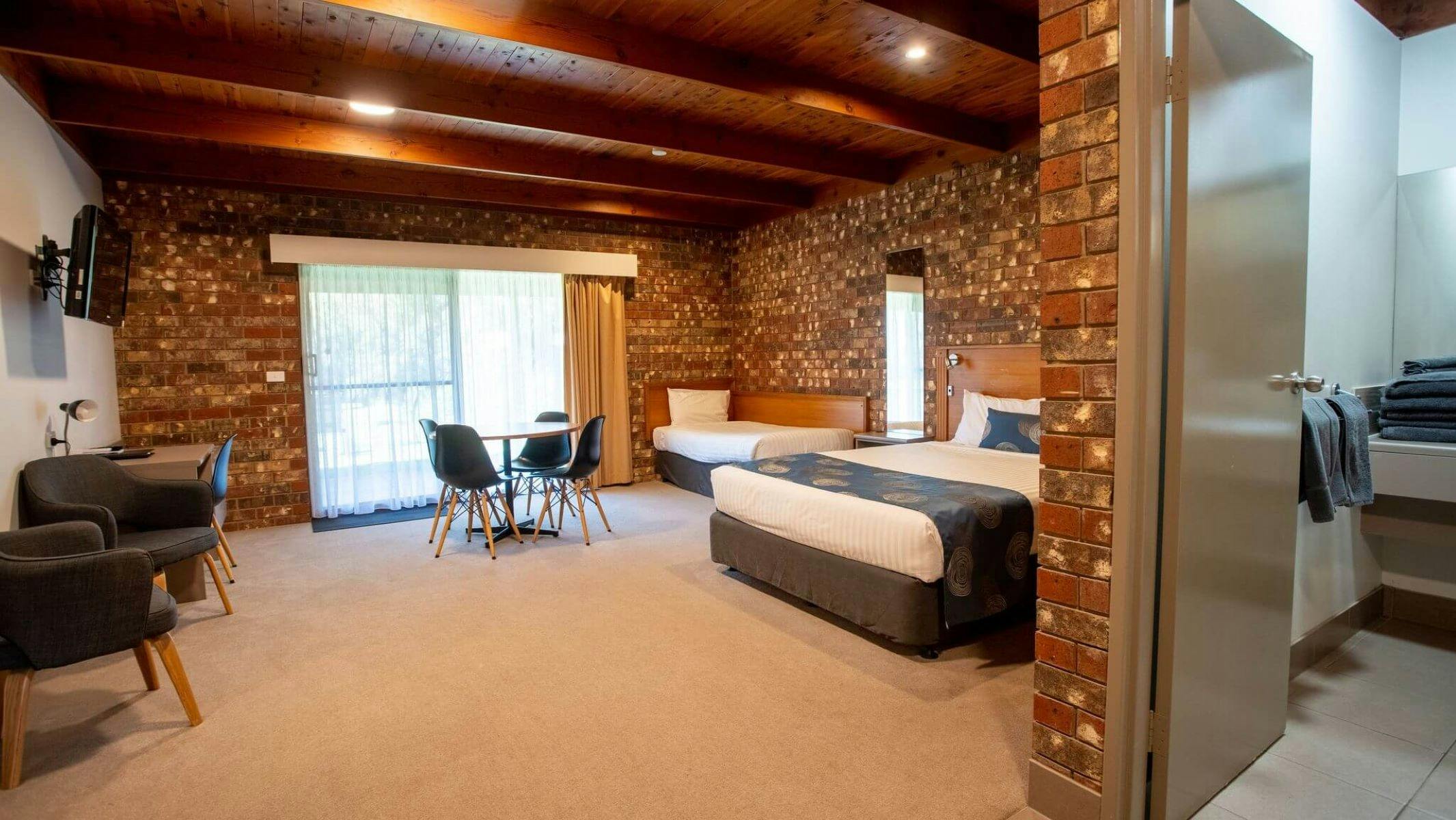 Family Room, sleeps 5, one queen bed and 3 single beds