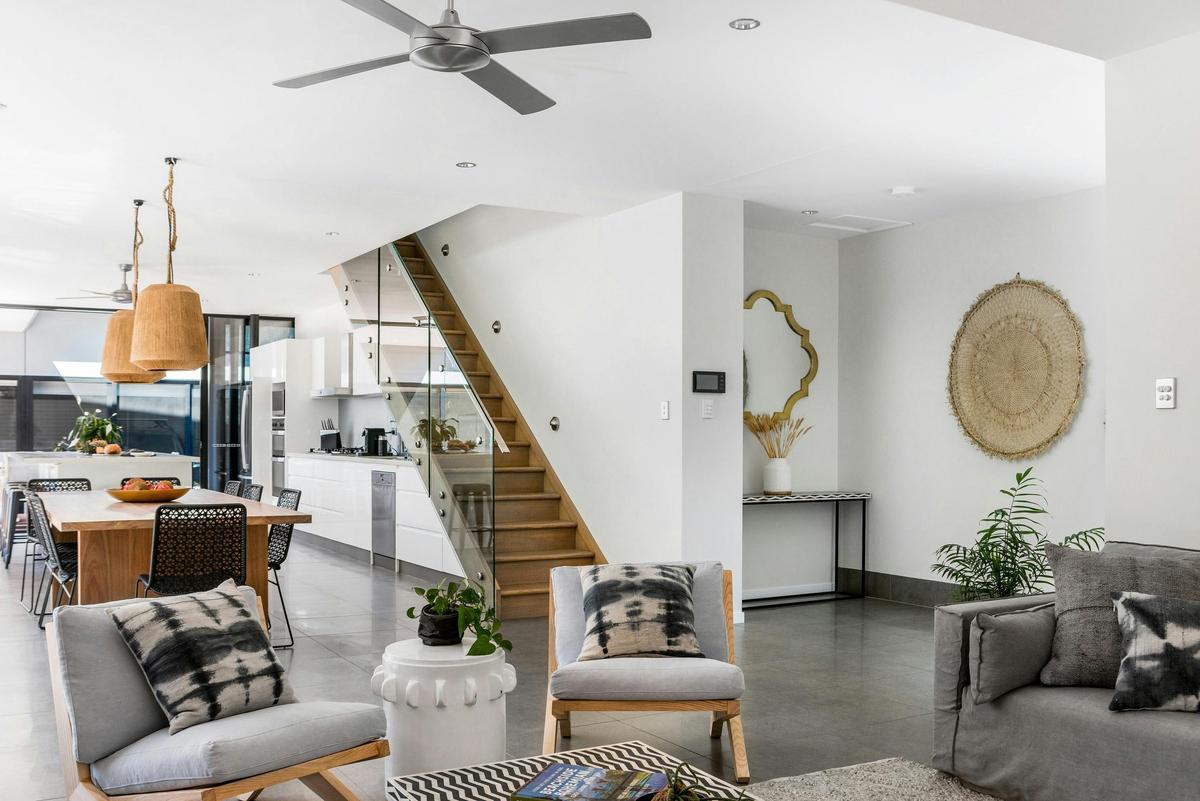 Catalina's Byron Bay loungeroom looking backto dining room and front entry way