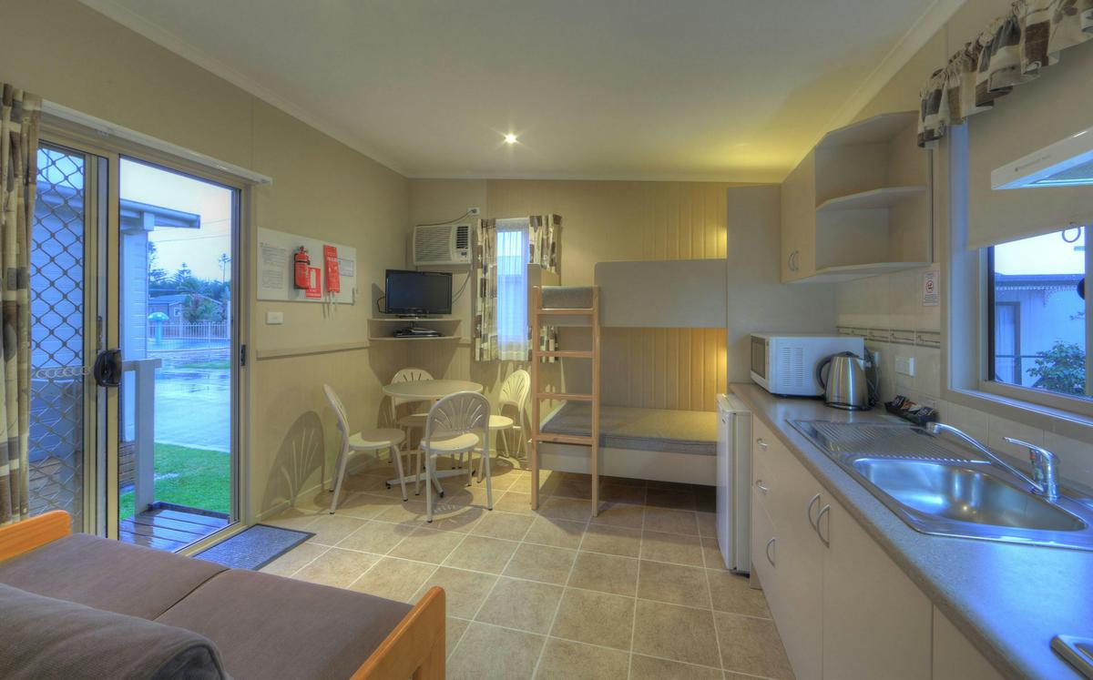 1 Bedroom Villa - Open Plan Kitchenette, Living Area & Bunks