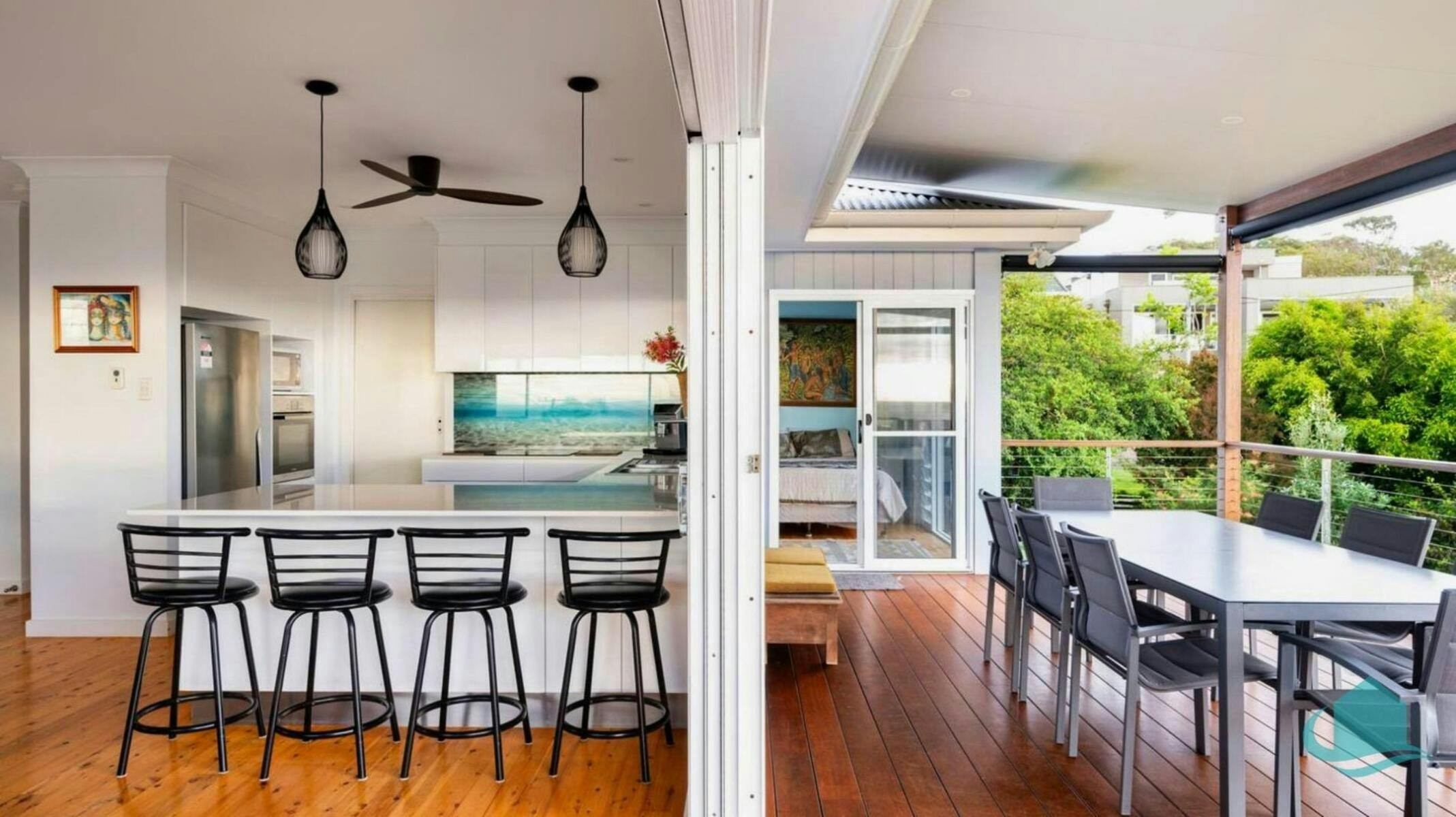 View of kitchen  and undercover deck area, bringing the inside out