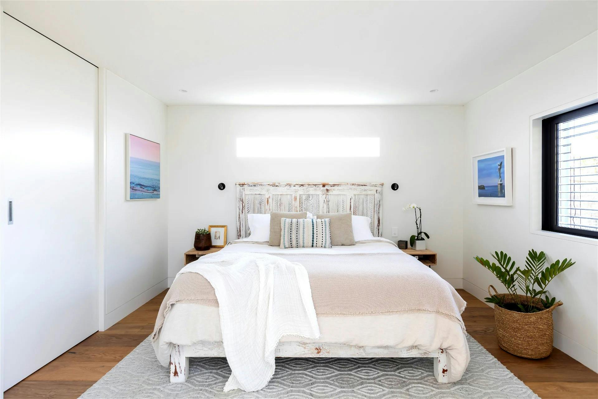 Modern minimalist bedroom with sleek furniture and neutral color palette