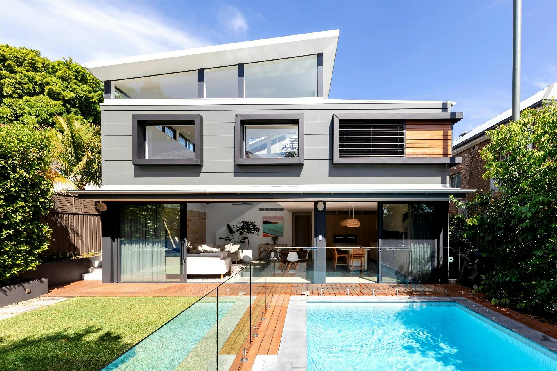 large glass sliding doors and tranquil views of the pool encourage a slower-paced lifestyle