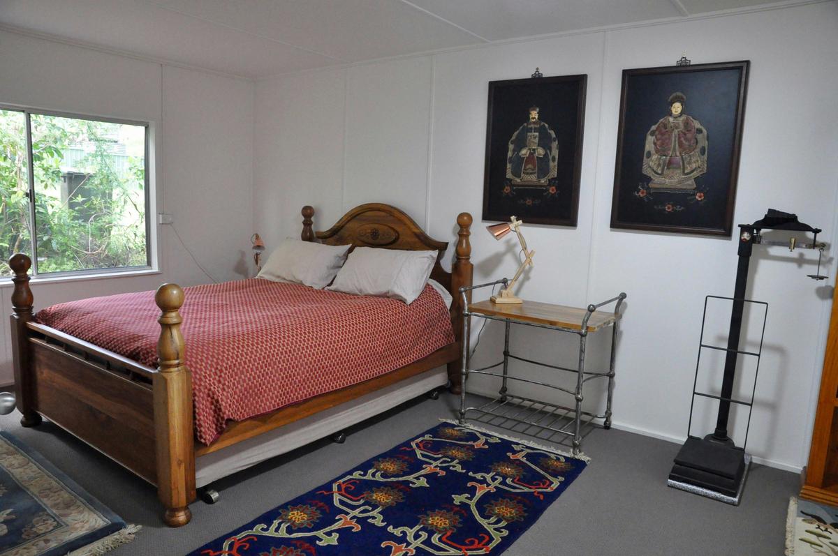 Large bedroom with Queen size bed featuring a Sealy Posturepedic mattress - comfort plus!