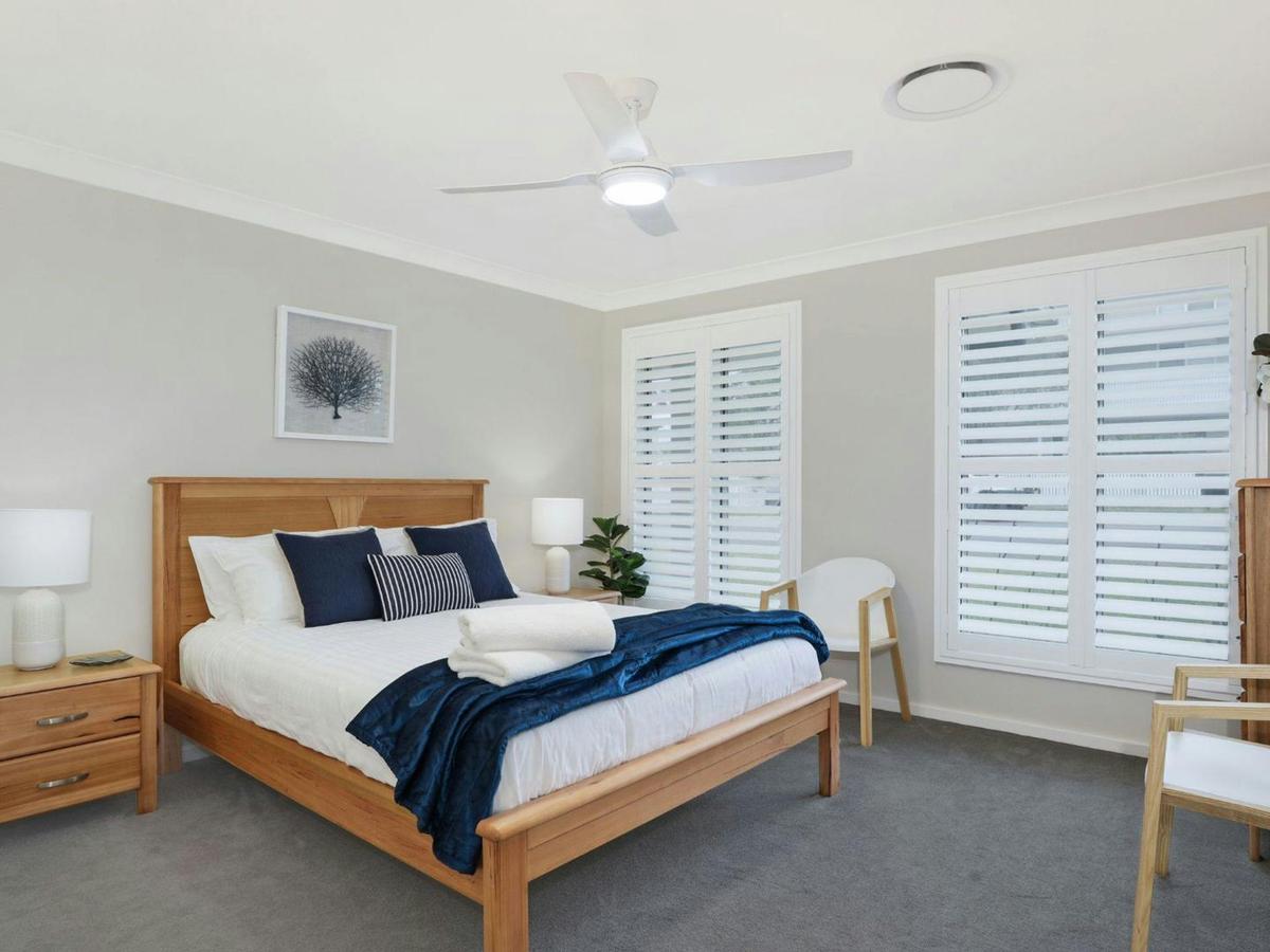 Coastal Drift | Queen | Ensuite bathroom | Air conditioning | Ceiling fan | Smart TV
