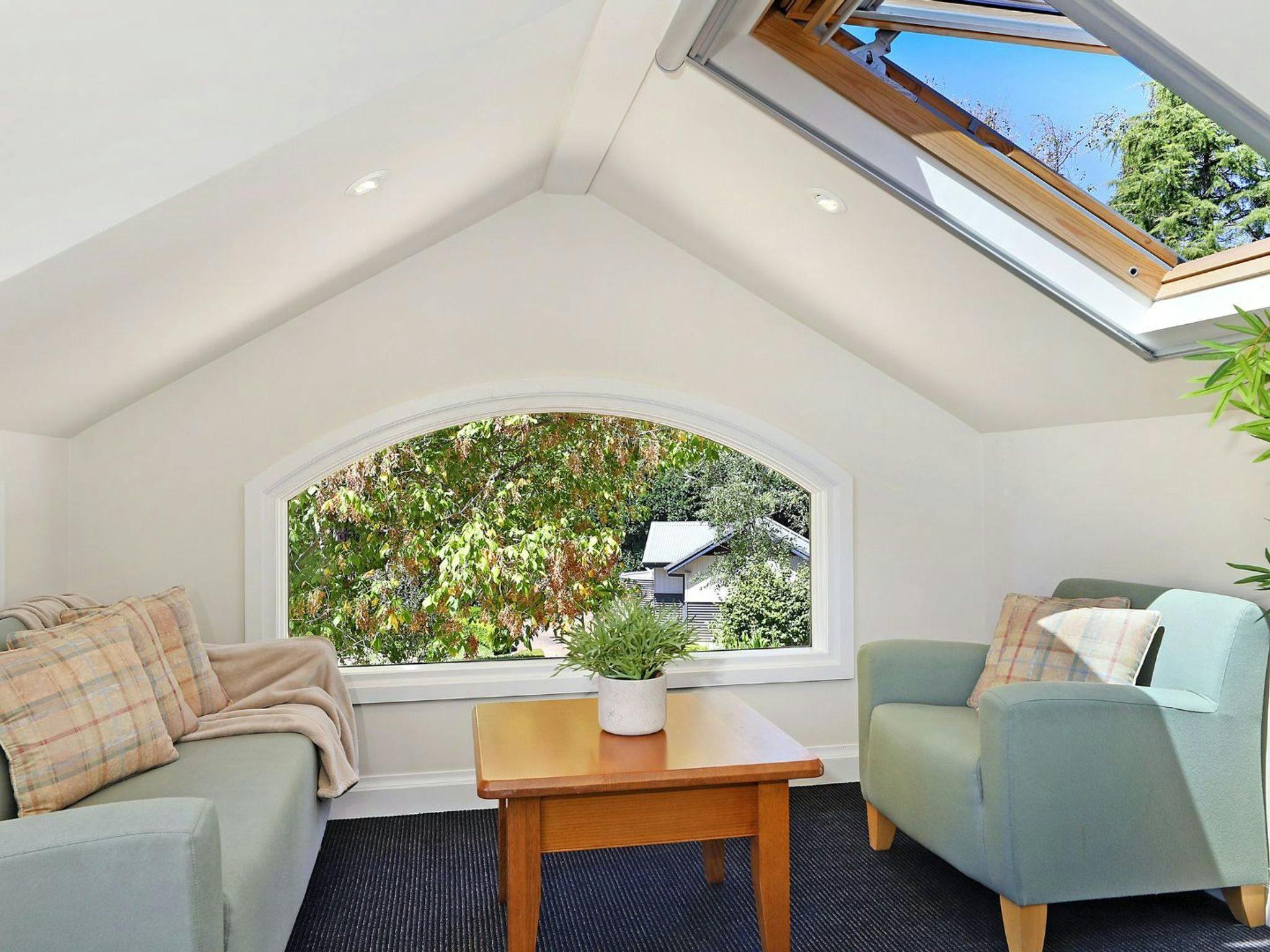 Centennial Views Apartment | Light-filled sitting room