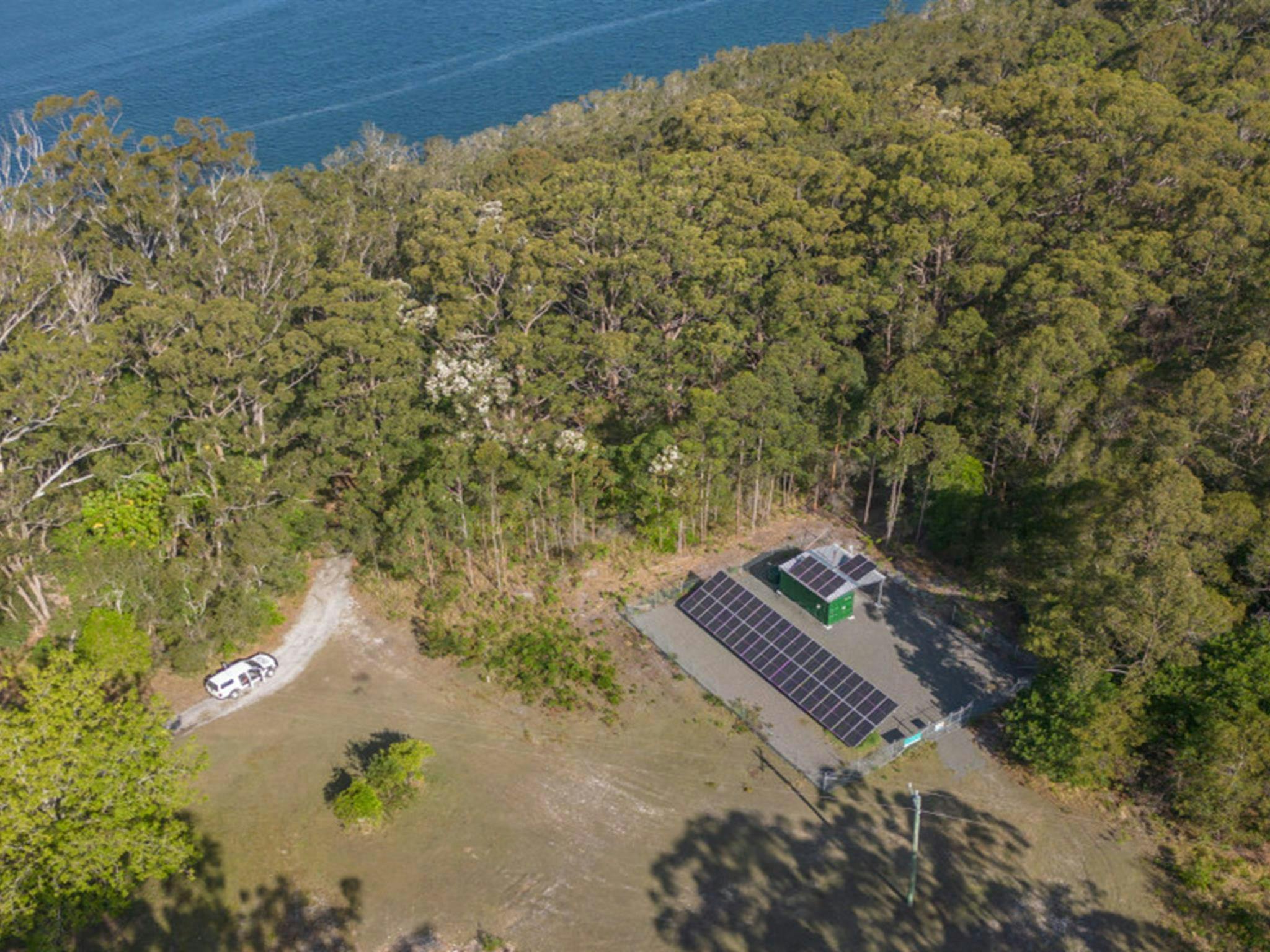 Aerial view of Cutlers Cottage near the lake's edge. Credit: John Spencer &copy; DPE