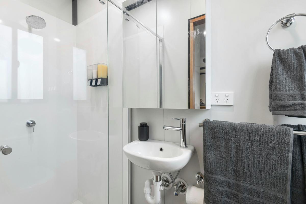 Fully functional ensuite bathroom with shower, flushing toilet, linen and toiletries provided.