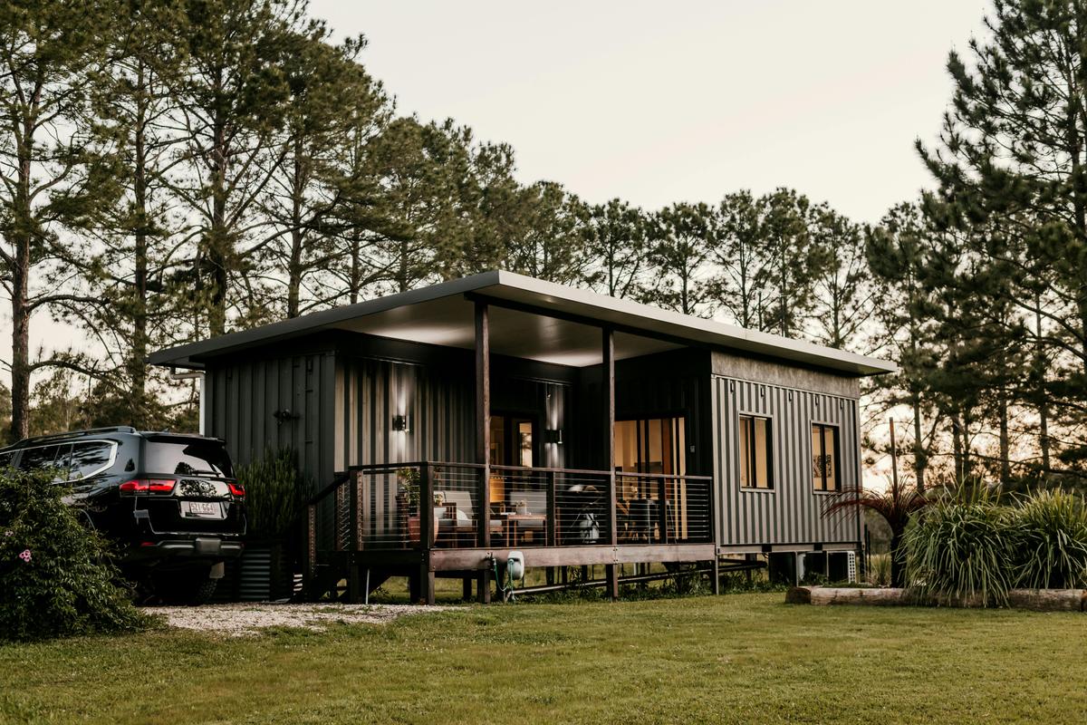Modern cabin made from recycled containers, nestled in nature at Contained in Nimbin.