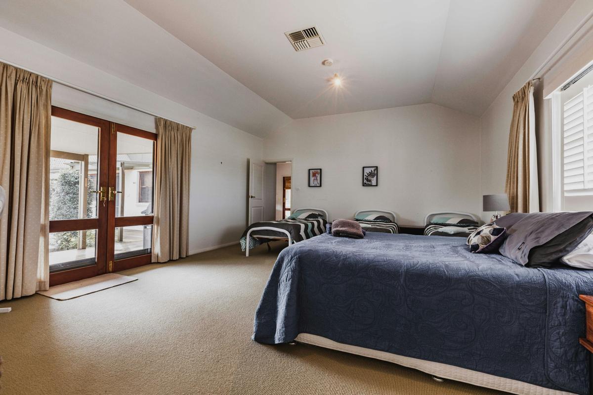 Family Suite fitted with a Queen Bed and 3 Singles