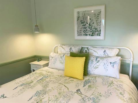 Cobark Suite has a king bed with luxury linens