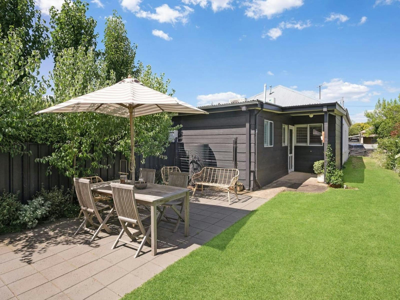 Outdoor dining area at cosy luxe villa