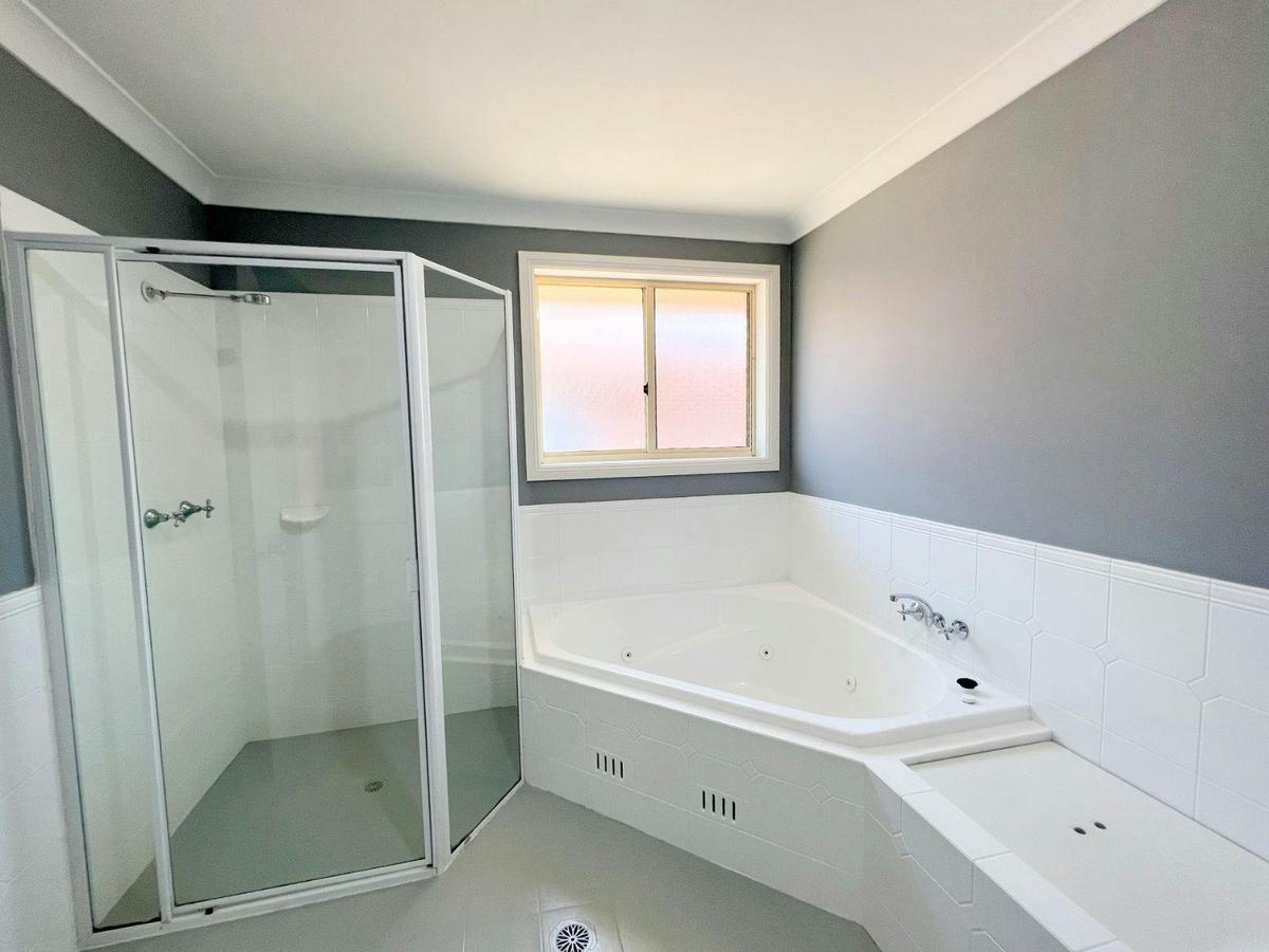 Bathroom with shower and bath