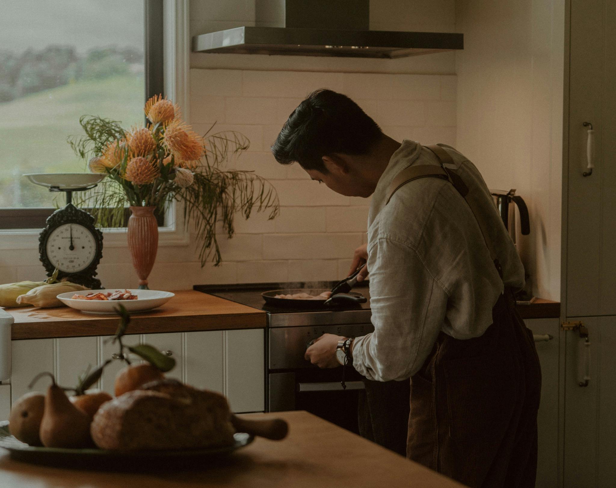 Cooking in the well equiped kitchen