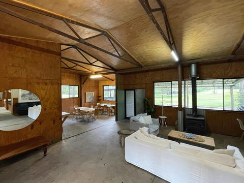 Huge living space with pot bely stove and large kitchen