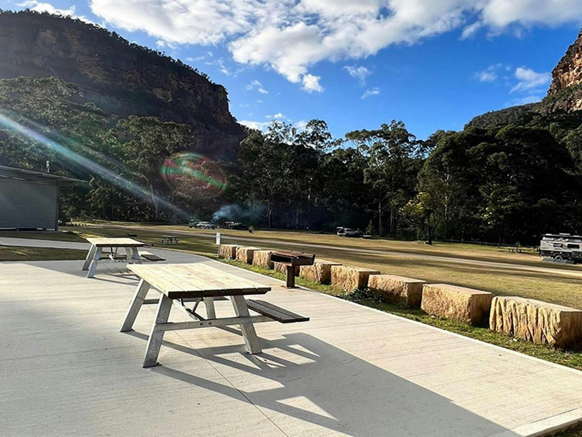 Picnic tables located on the wheelchair-accessible campsites. Credit: &copy; DCCEEW