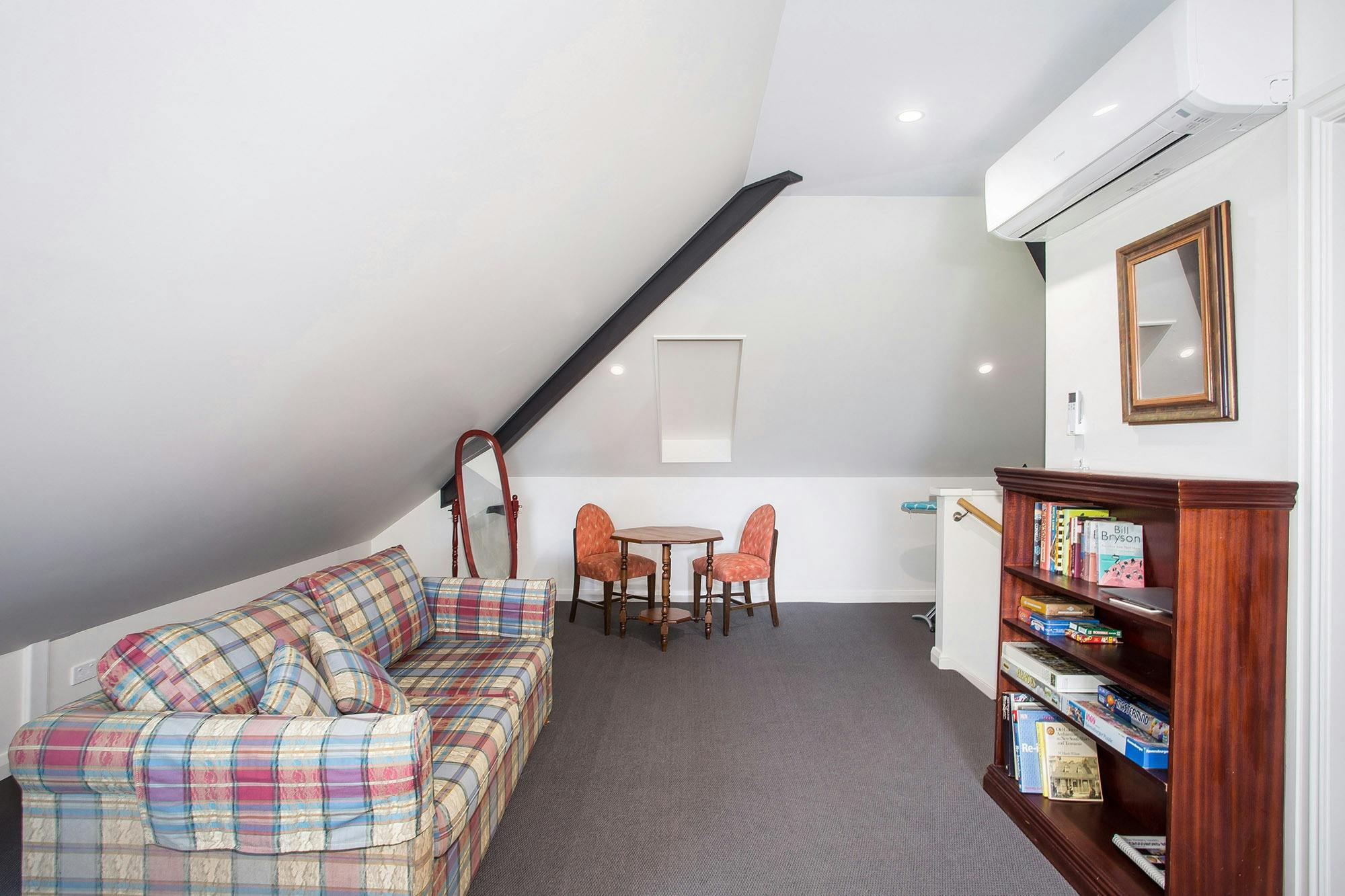 Spacious working area, full-length mirror, ironing board