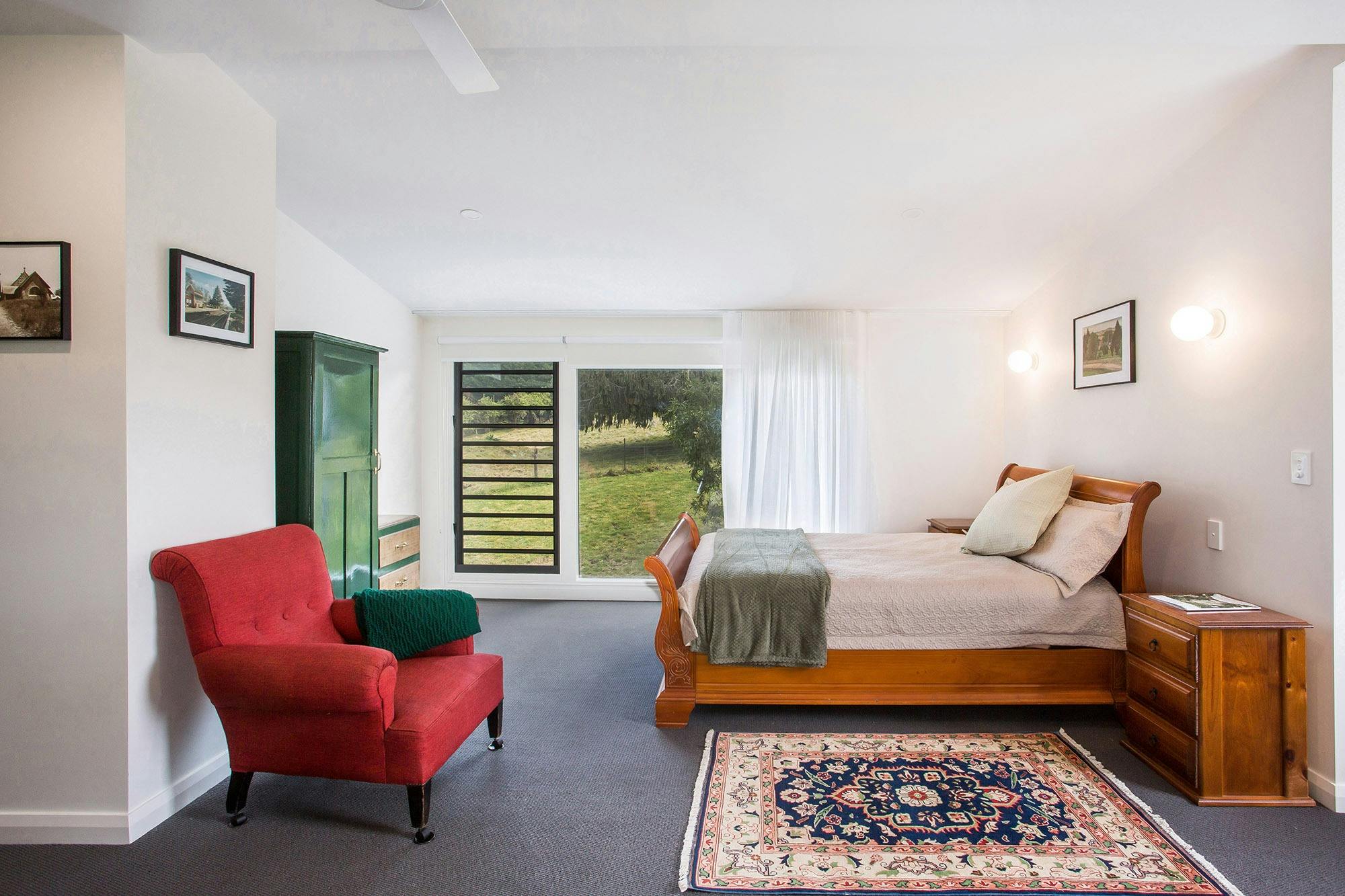 Spacious queen bed with large picture window to pastoral outlook