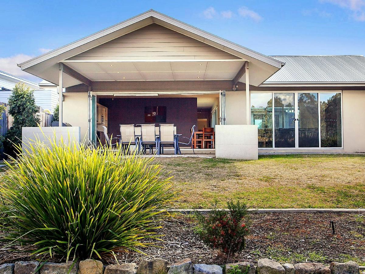 Dashaz Dream outdoor dining area looking back at the house