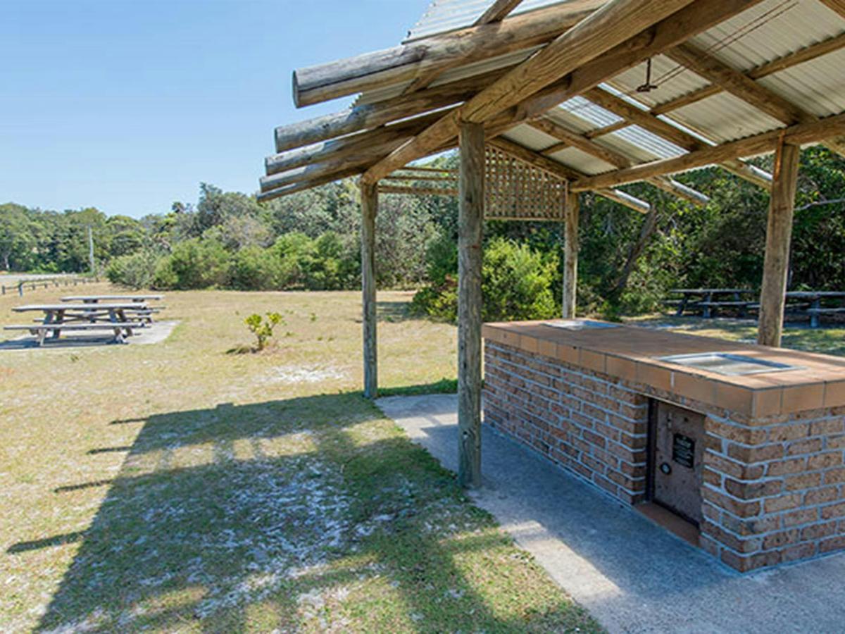 Shelter over barbecue facilities, Elizabeth Beach picnic area, Booti Booti National Park. Photo