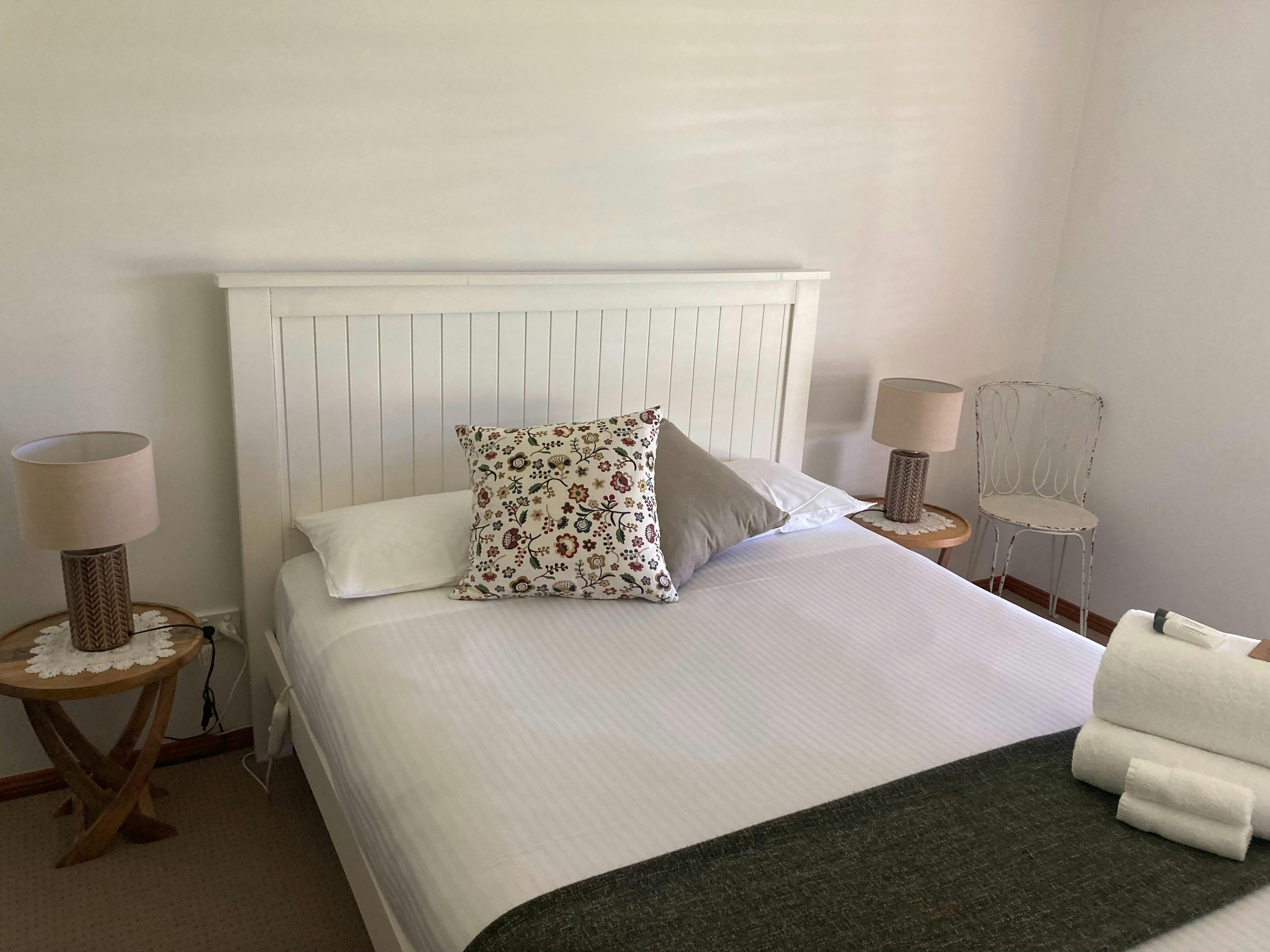 Snuggle in for the night in the sojourn queen bedroom as you gaze across our Shiraz block