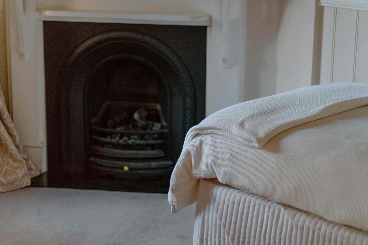 Curraweena House features a wood fireplace perfect for winter getaways