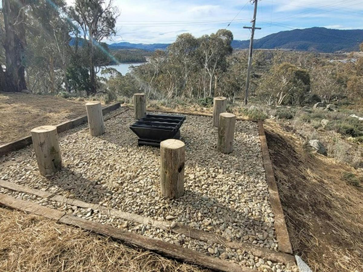 Fire pit at one of the Creel Bay cottages. Photo: Mark Lees &copy; DPIE