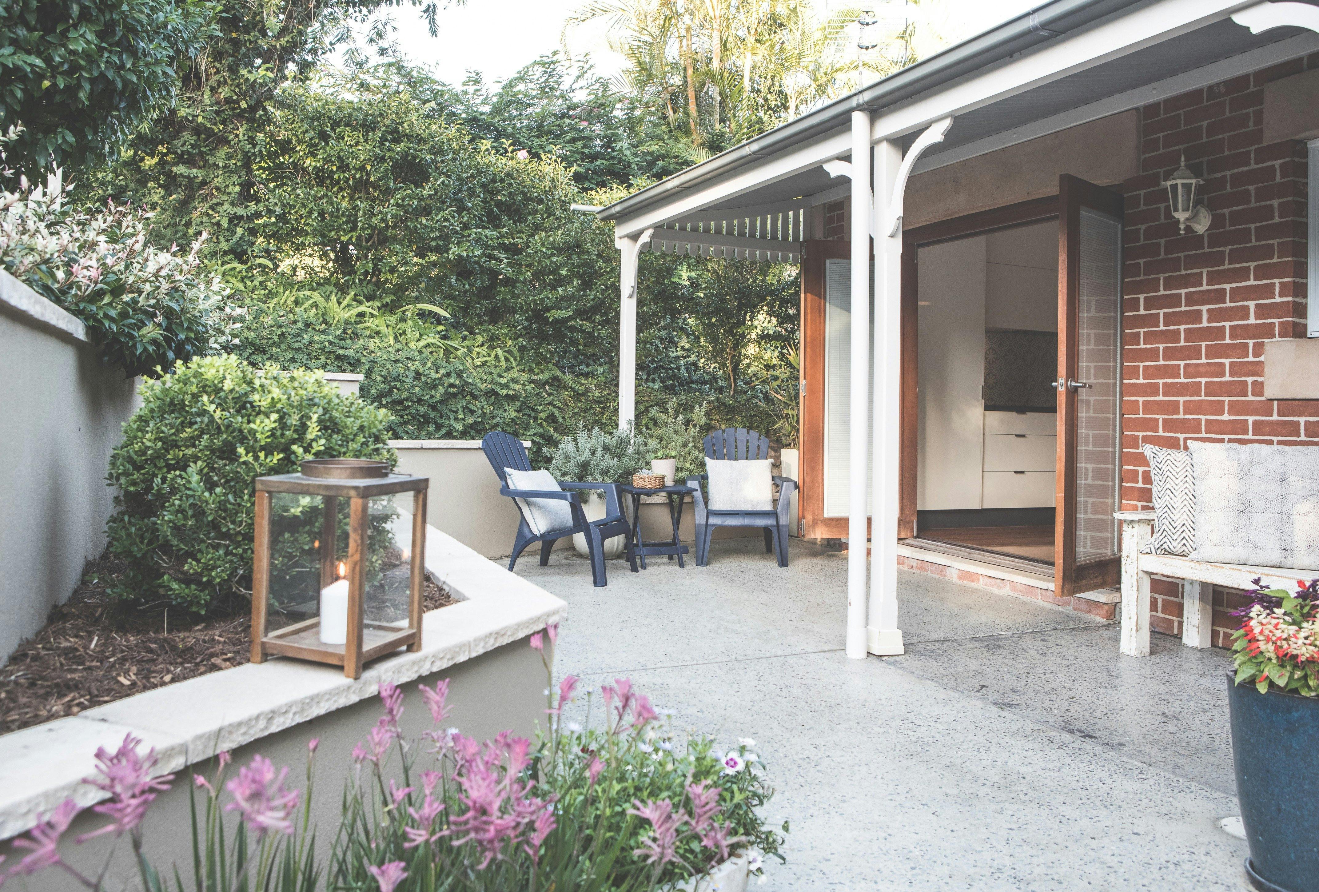 French bi fold doors open out from the kitchen onto the private courtyard area.
