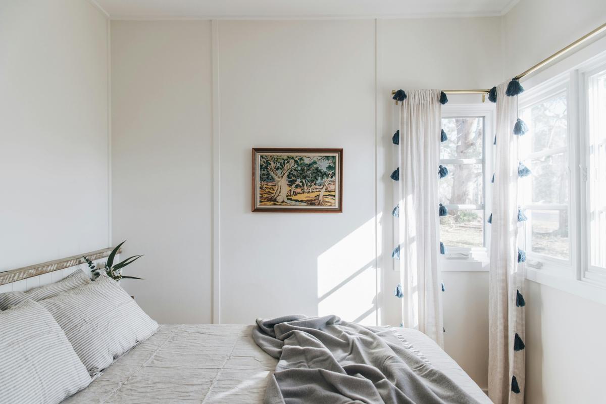 luxury bedroom with queen bed and pure linens