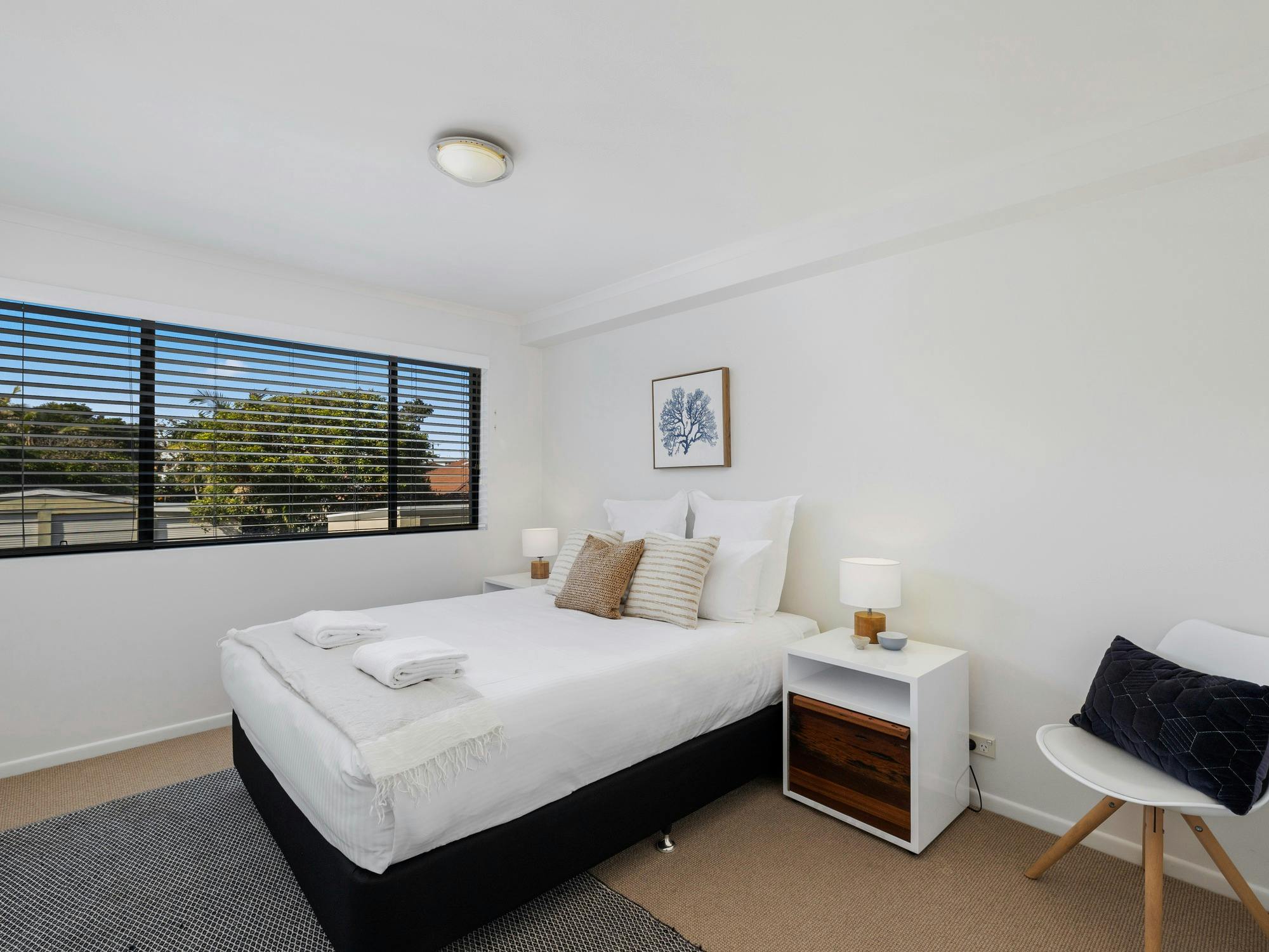 Master bedroom with queen bed