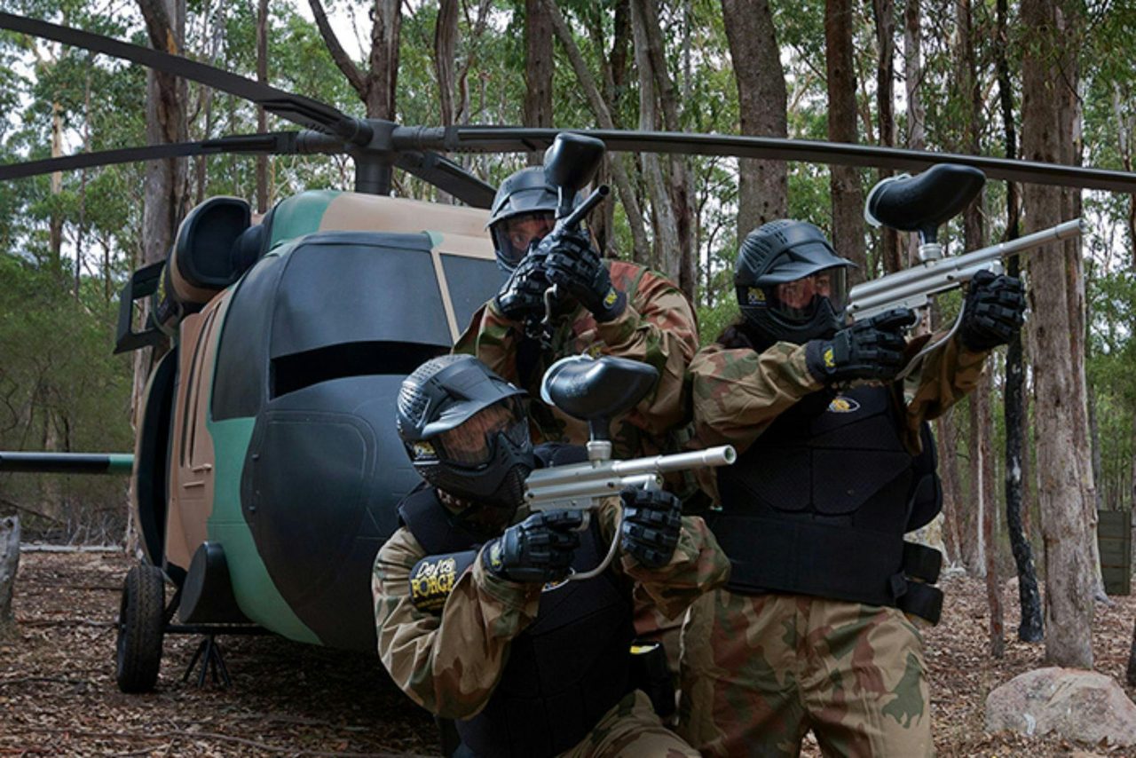 Three men with paintball