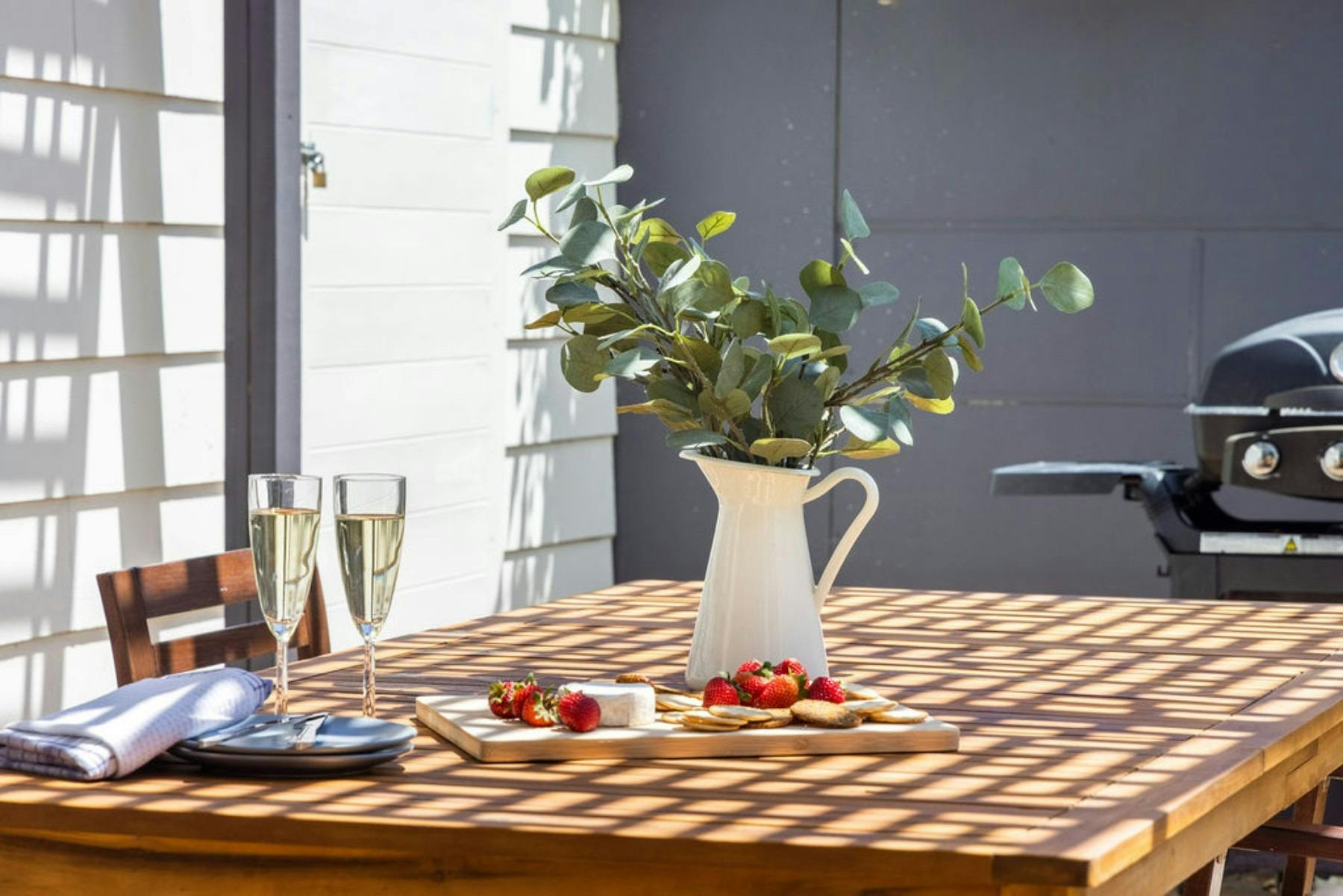 Outdoor dining area with gas barbecue for easy meals