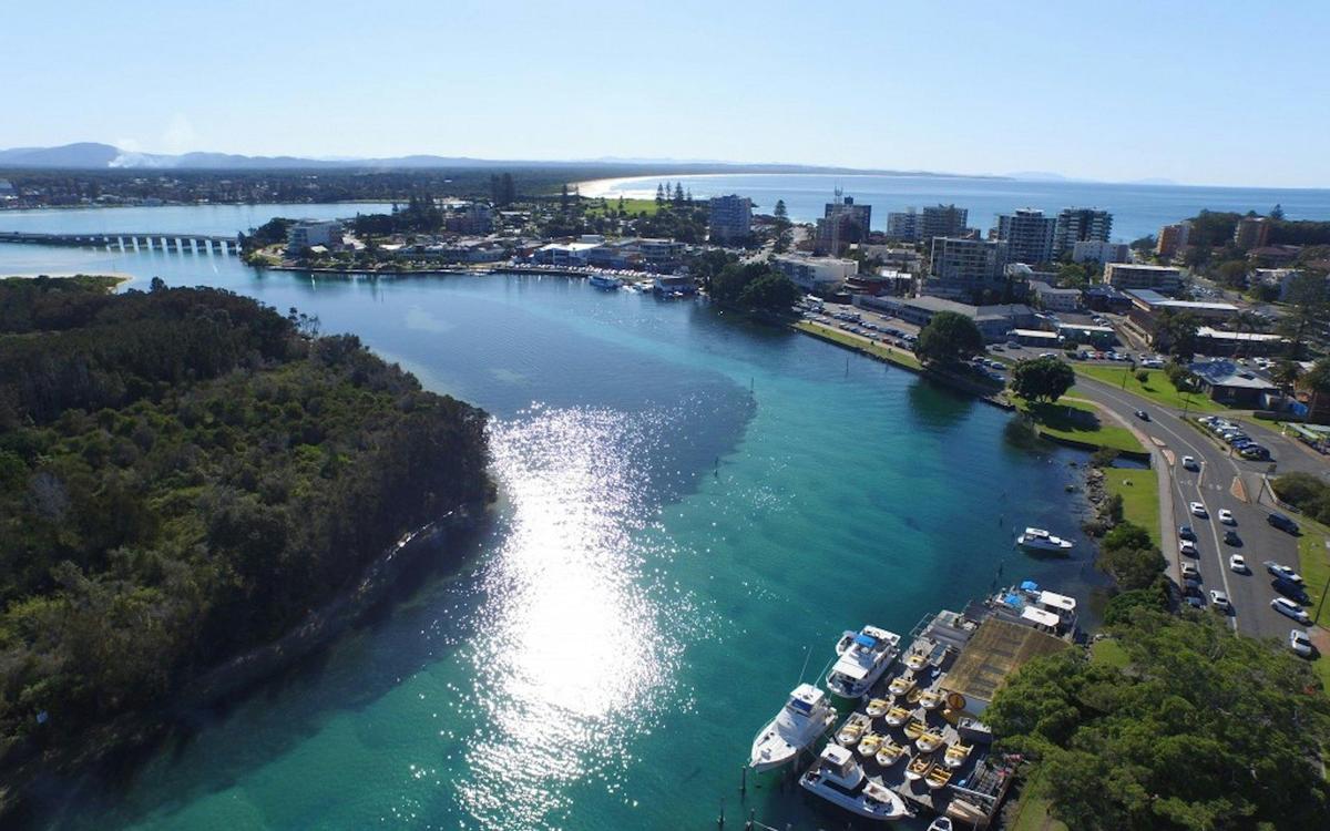 Cruise the crystal blue waters of wallis lake on your own floating oasis