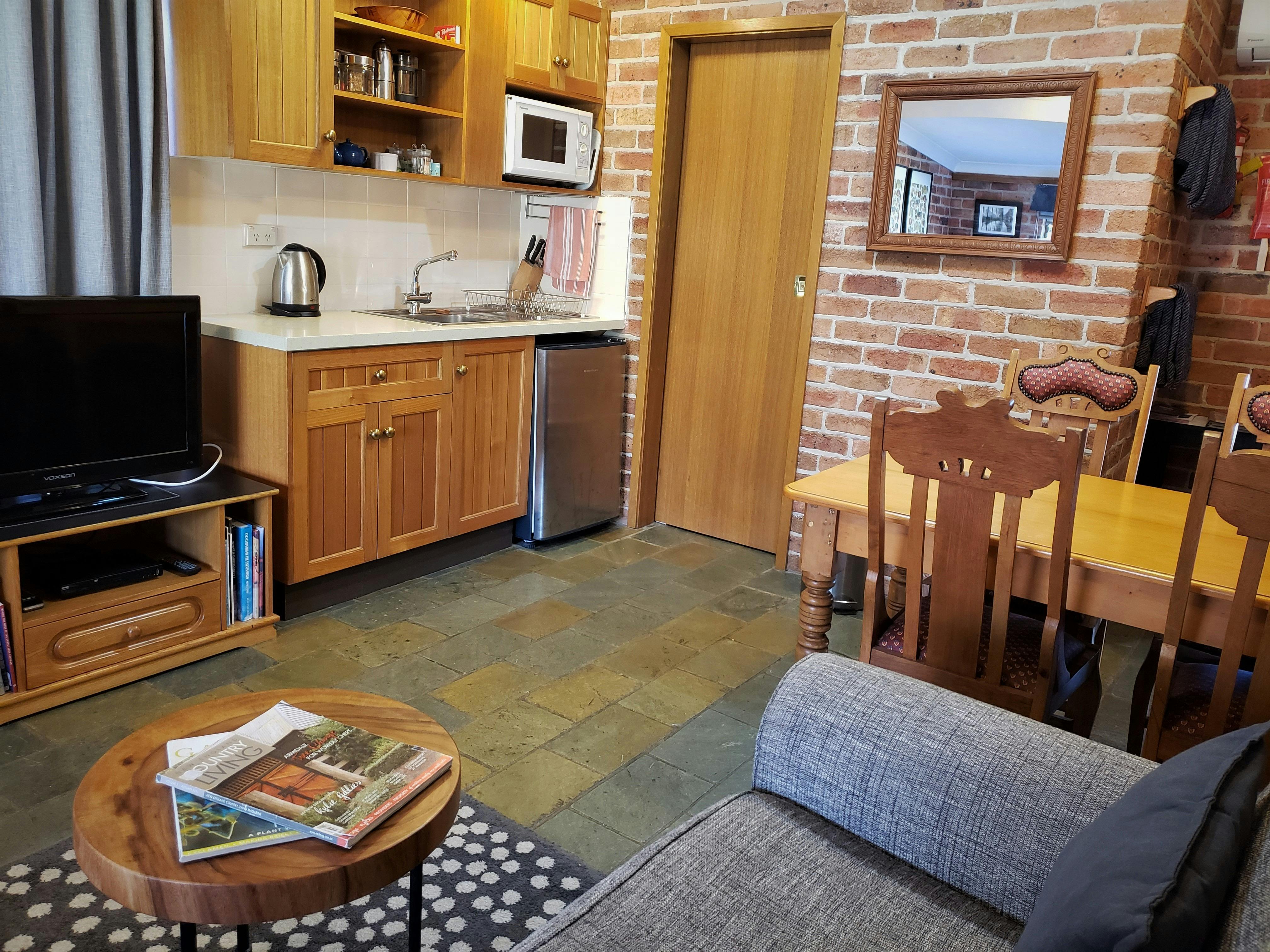 Kitchenette with microwave hotplates and electric fry pan.