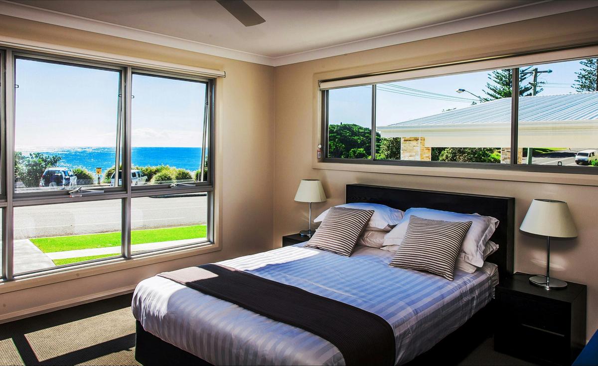 Escape at Nobbys - Beach House - Master Bedroom