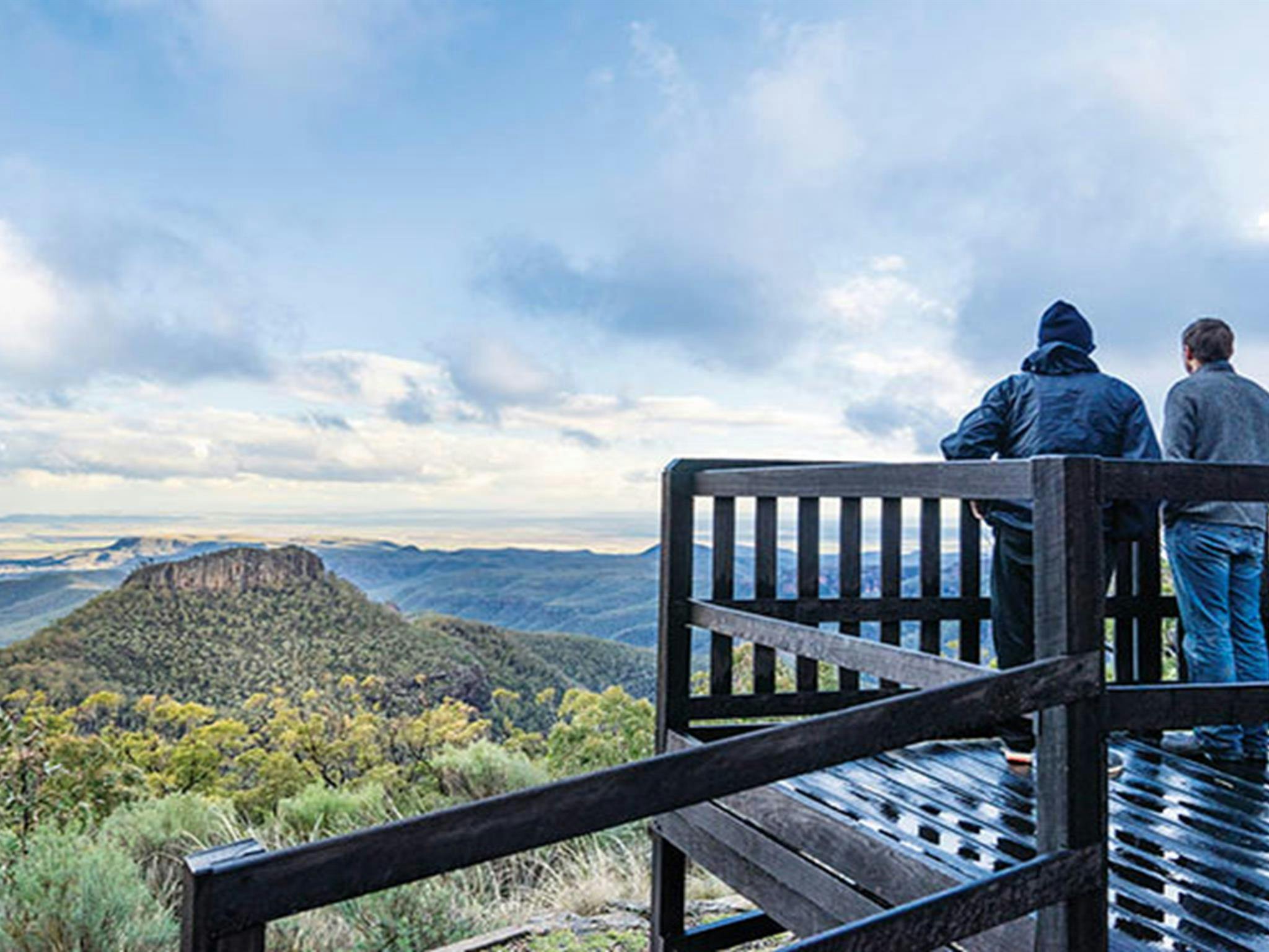 Friends looking at views at Doug Sky lookout. Photo: Simone Cottrell/OEH