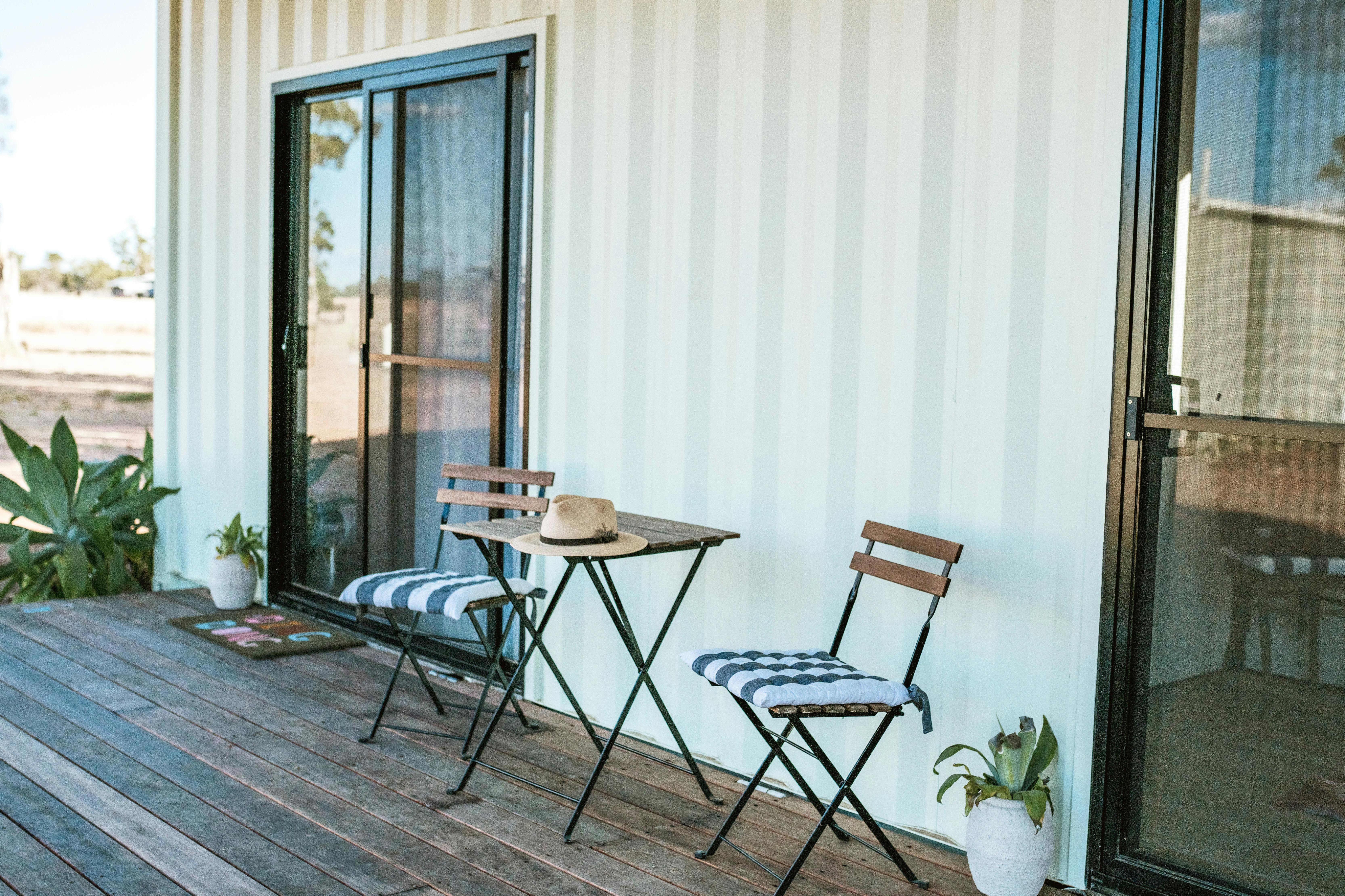The Cabin accommodation at Gilgooma with seating on the deck