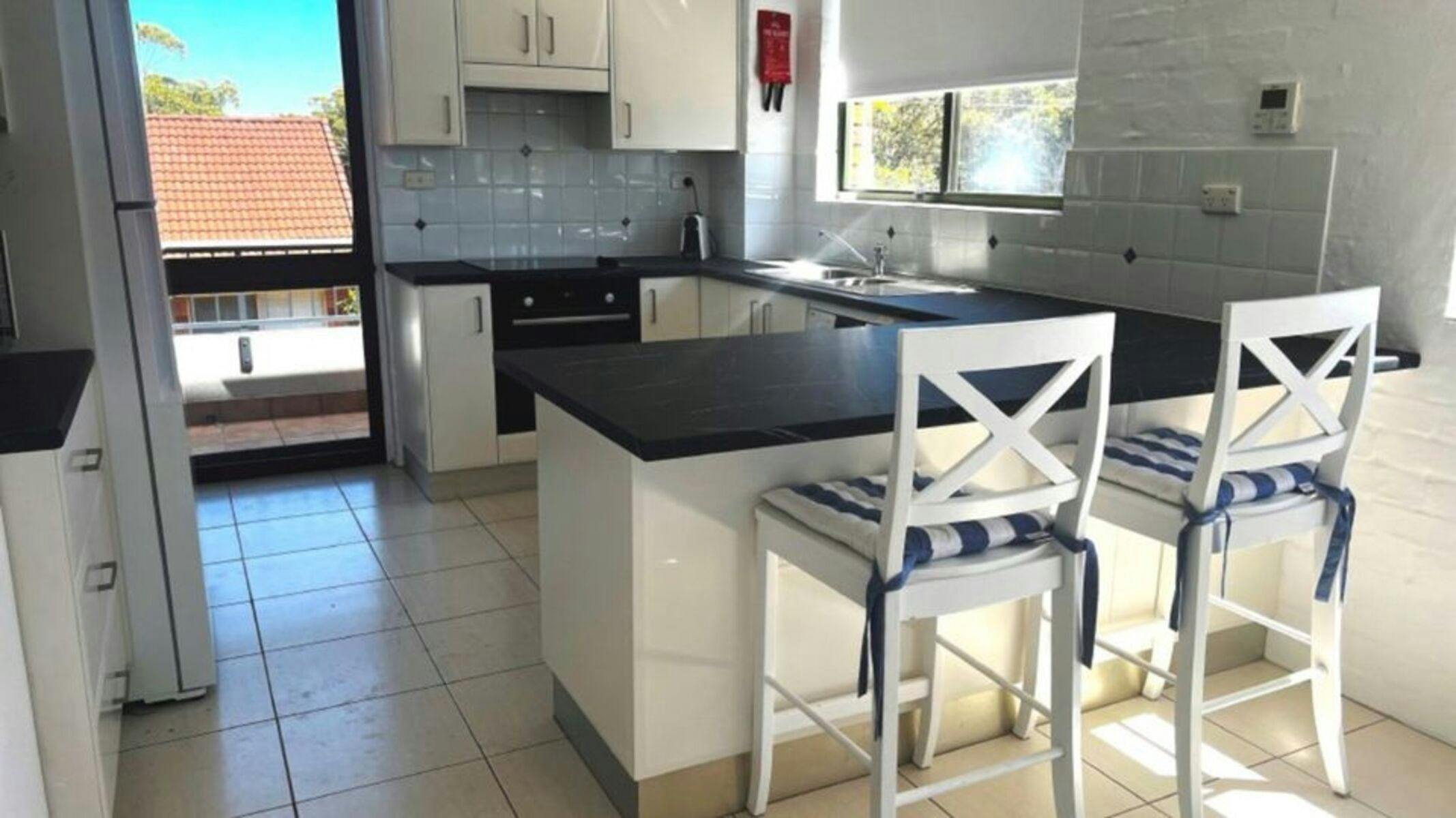 Breakfast bar and kitchen