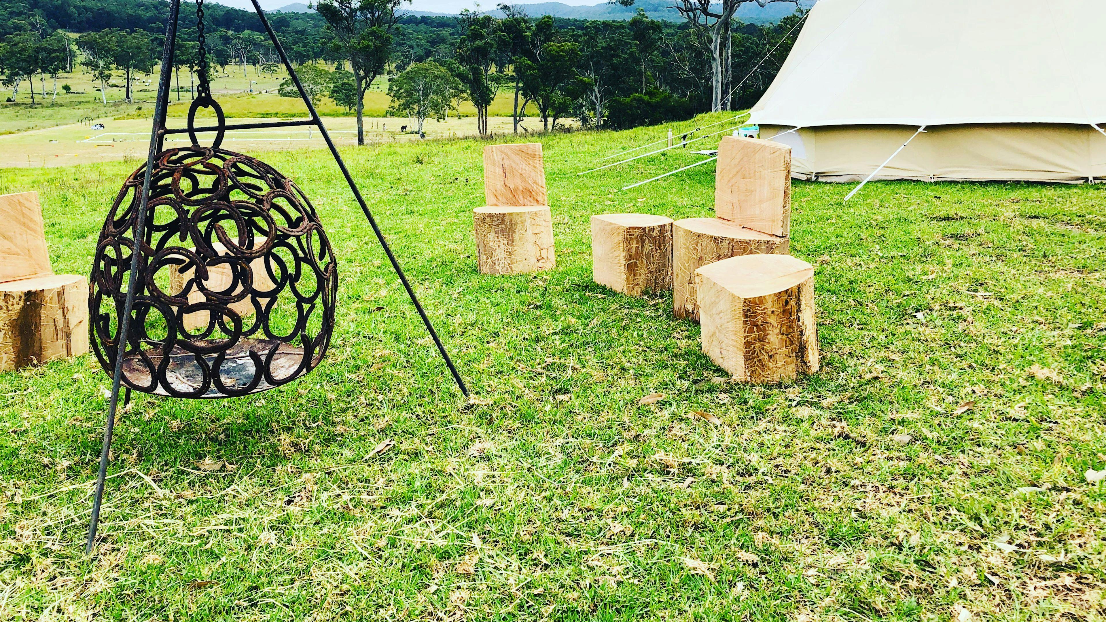 Glamping tents and fire/stools