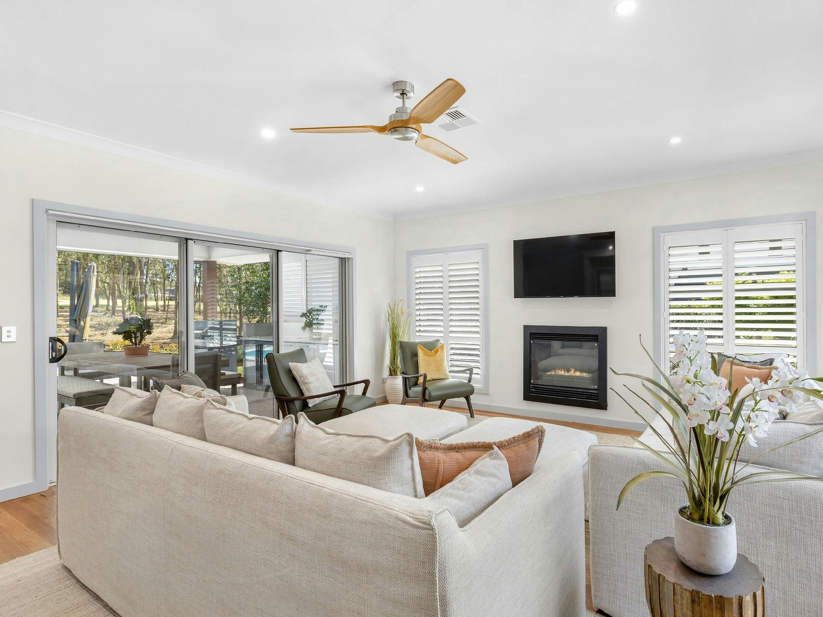 Hunter Dreaming lounge room with fireplace and TV
