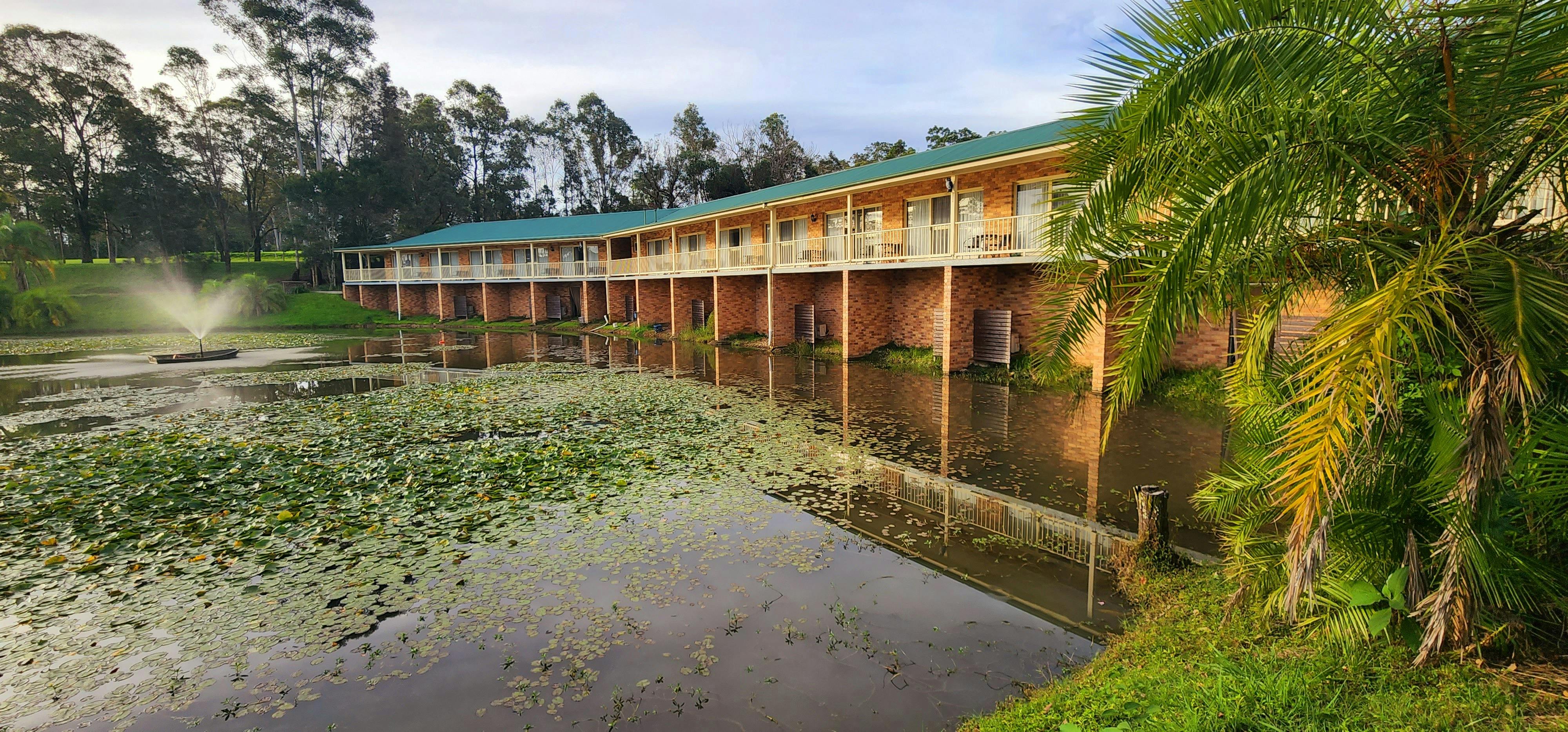 Back View of Motel with Natural Pond and alot of fishes