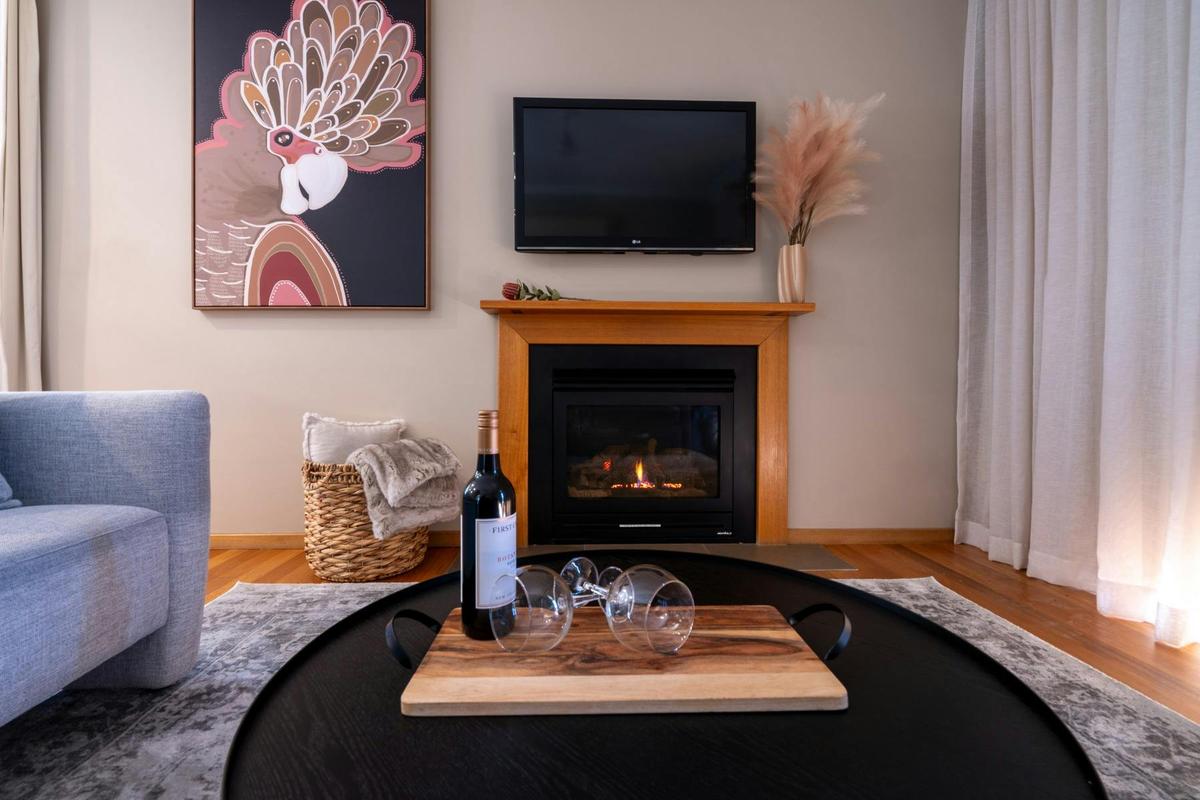 Premier Suite living area and gas fireplace