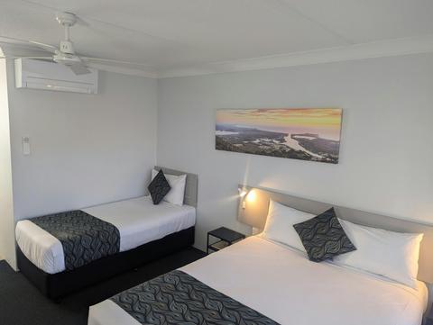 Twin Motel room Queen bed and Single Bed